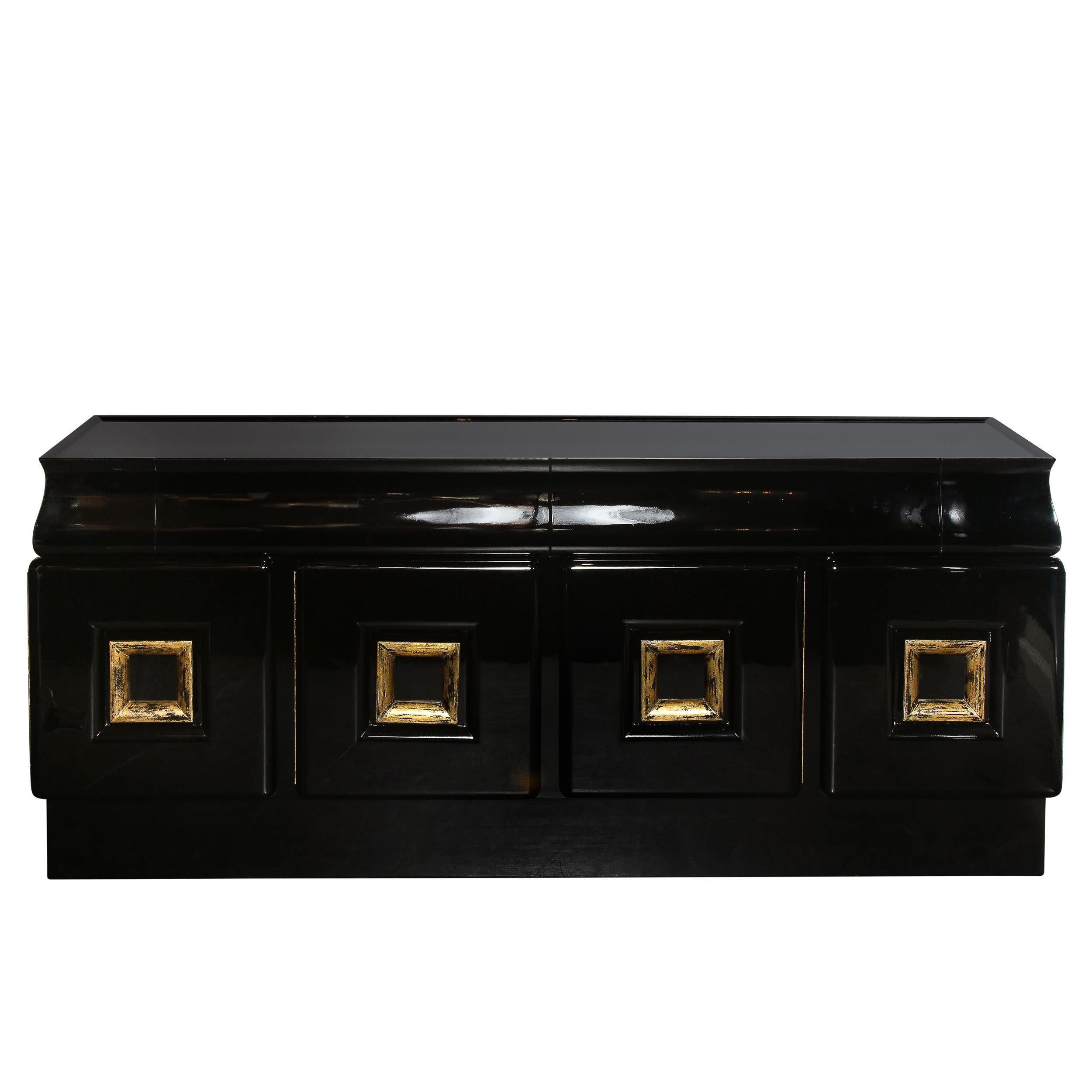This sideboard, signed by the illustrious 20th century designer James Mont, has an impact rarely seen. Bold and forward facing, this sideboard is beautifully restored in gleaming Black Lacquer with original gilded wood surfacing on each of the four