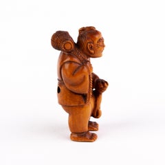Netsuke Inro japonais signé représentant un pêcheur