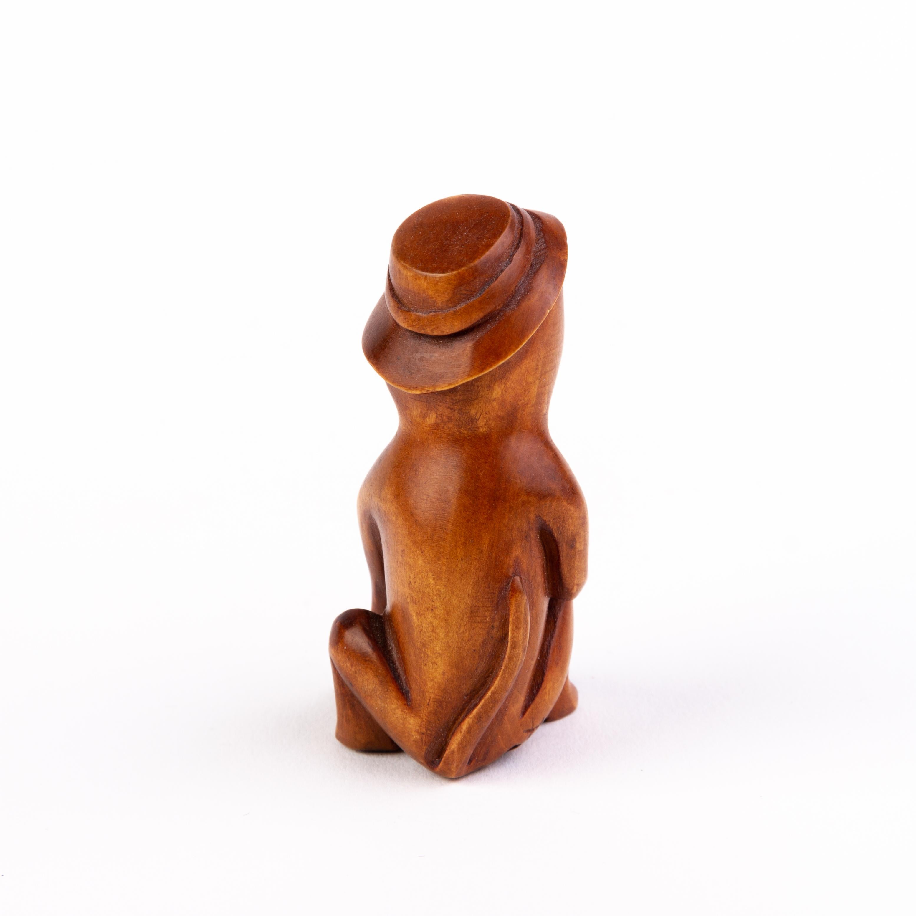 Signed Japanese Carved Boxwood Netsuke of a Cat with Hat In Good Condition For Sale In Nottingham, GB