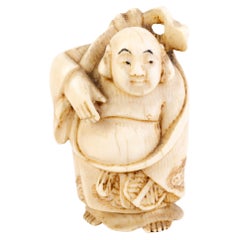 Netsuke Inro japonais sculpté représentant Bouddha 