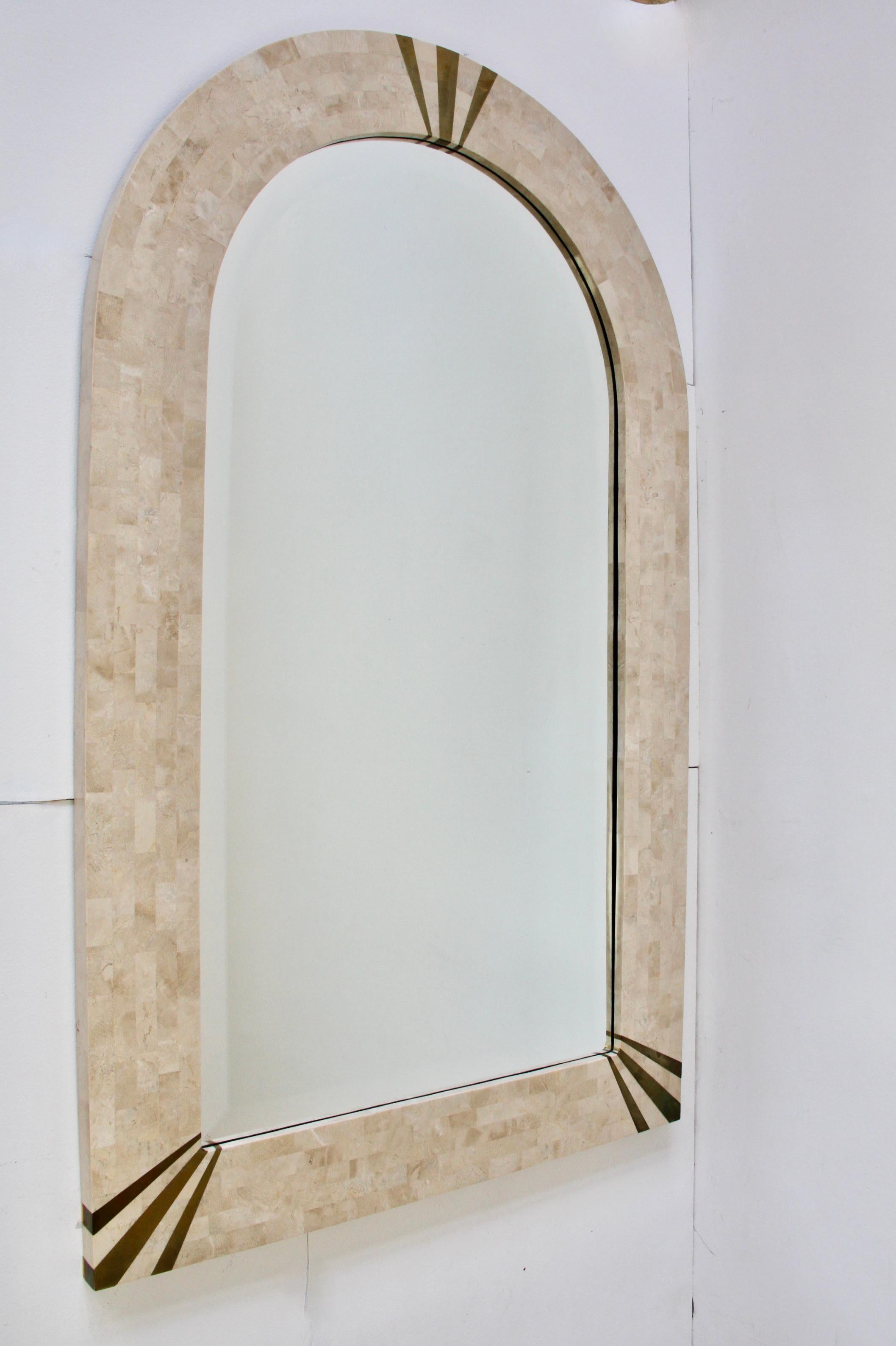 Stunning, large, tall and very rare 'signed' domed or curved top Mid-Century brass and tessellated stone wall-mounted / hung vanity or hallway bevelled edged mirror by legendary German / American designer Karl Springer (1931-1991), America, circa