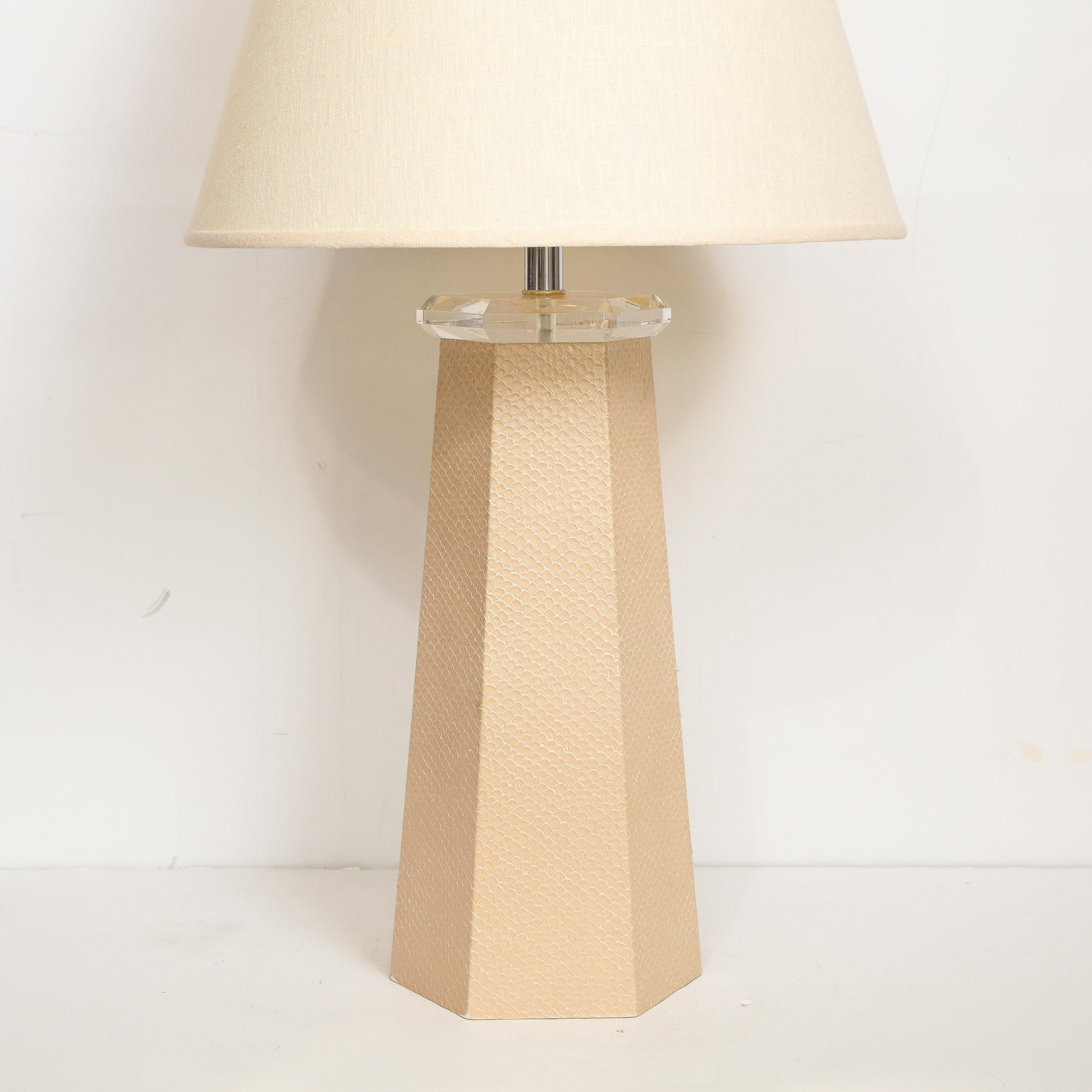 This refined table lamp was designed by Karl Springer, circa 1980, and realized in the United States. Springer, who began his career by crafting small desktop accessories, took inspiration from the 1920s and 1930s and helped fuel the renewed