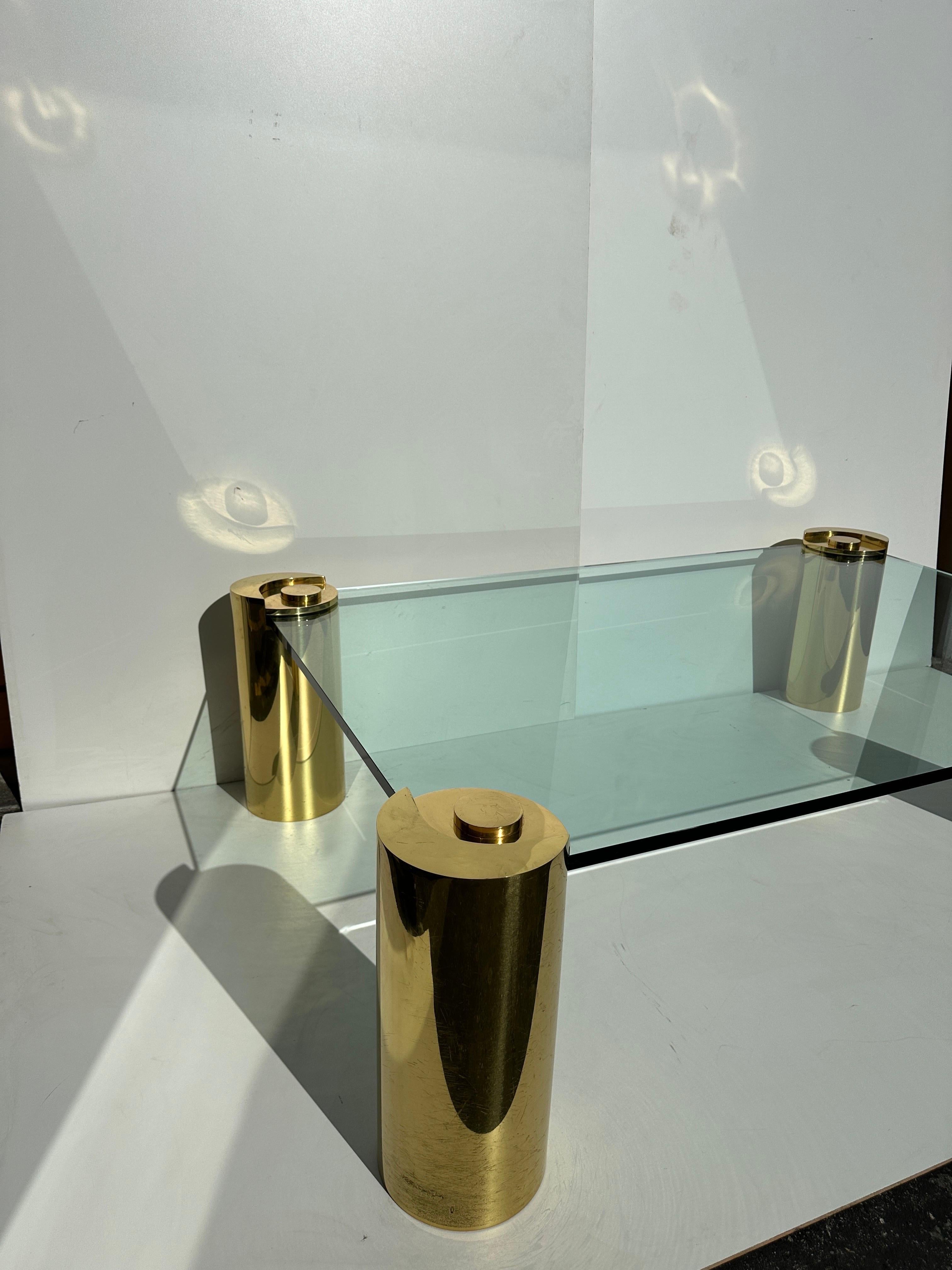 Signed Karl Springer tubular brass coffee table with rectangular 3/4” thick glass.
Each brass cylinder is 8” diameter by 20” high.
Only glass is 40” x 60” x 3/4” thick.
Overall dimensions are 44” x 64” x 20” high.
Glass table top is 17” high.