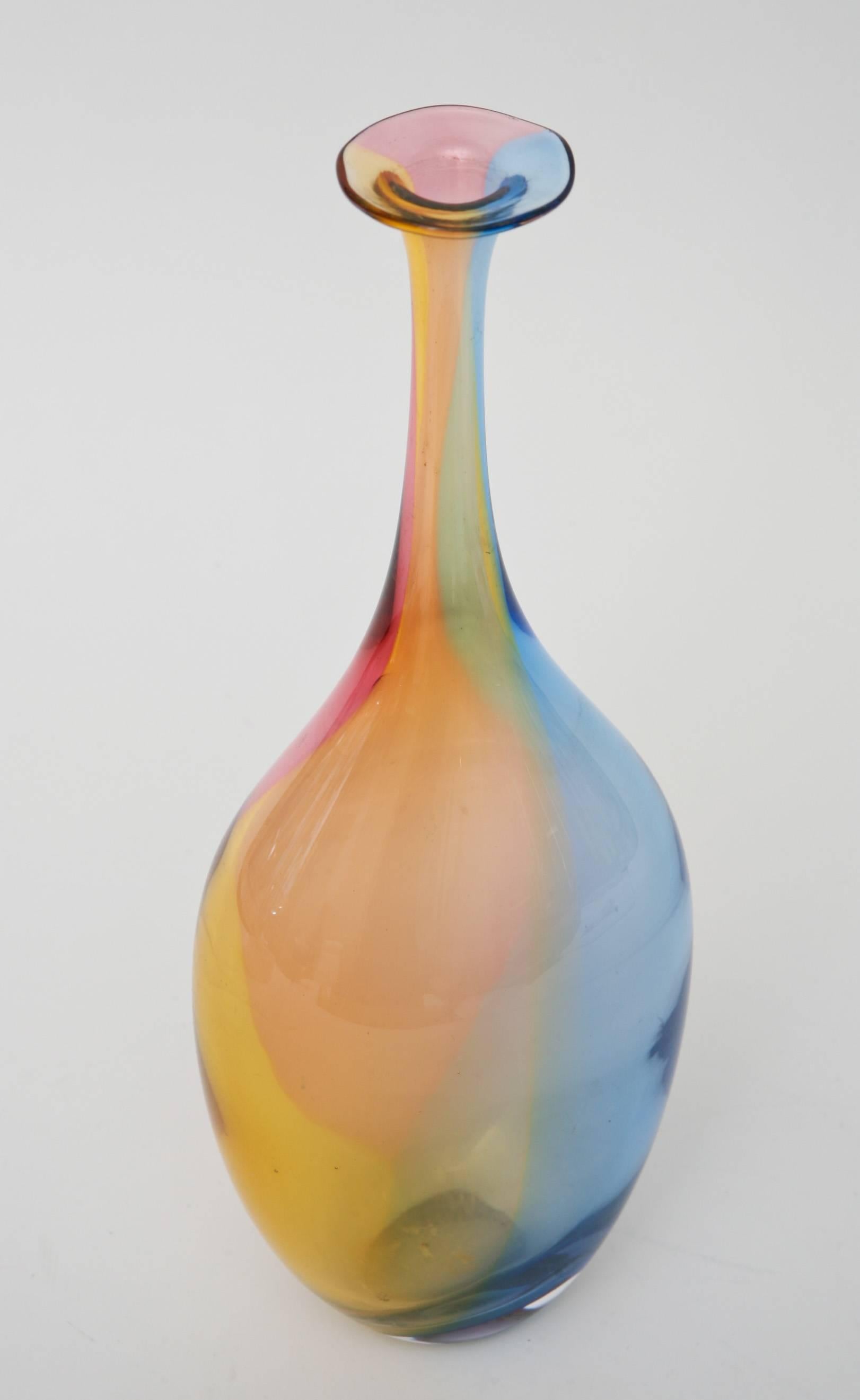 This beautiful Swedish glass object vase or vessel is signed and numbered K.Engman 488-38 Kosta Boda. It is delicate in weight and delicate in beautiful shape and color. It has an ethereal look and feel almost like a wisp of gorgeous subdued rainbow