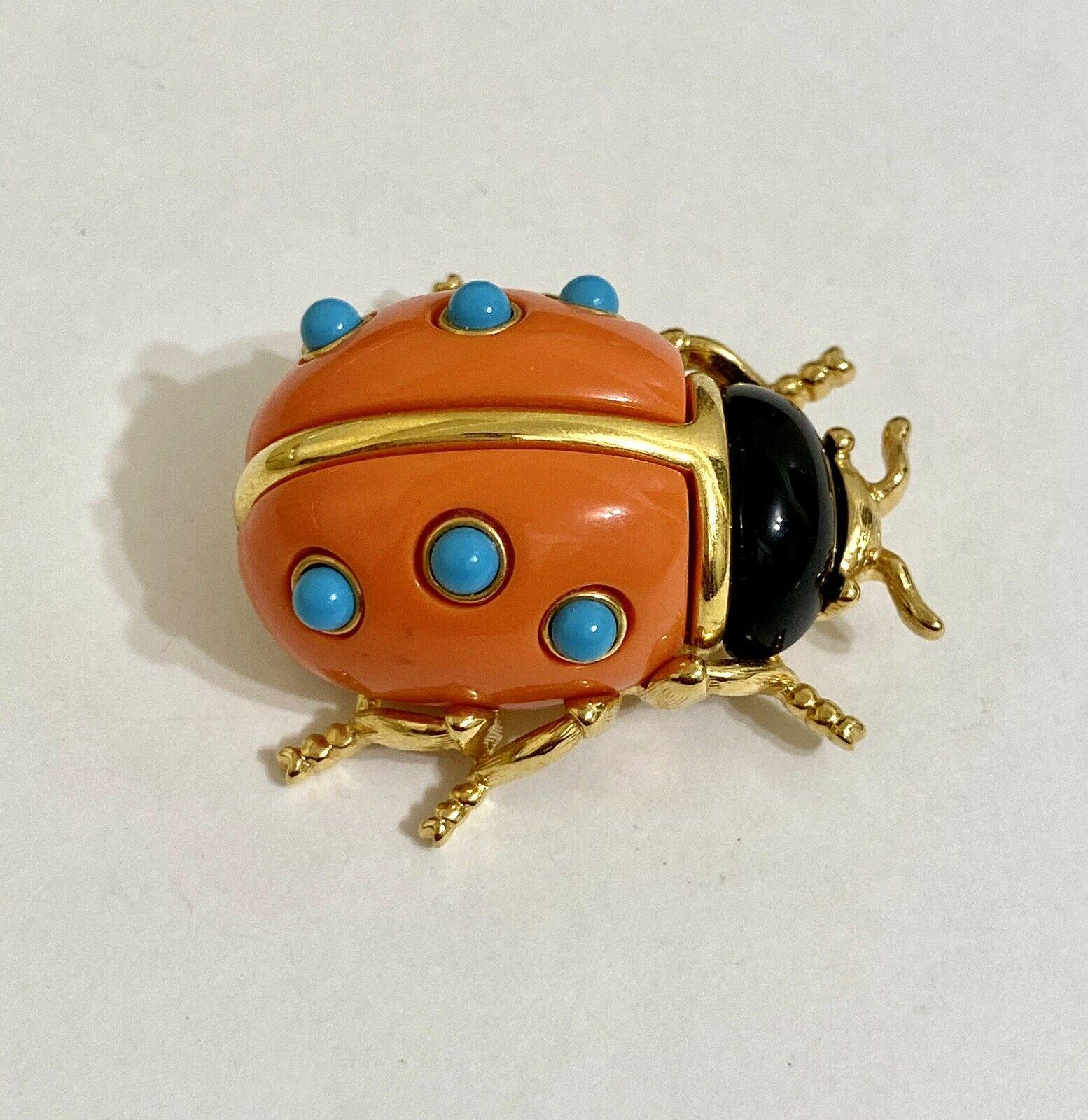 Delightful Ladybug brooch Faux Coral adorned with Faux Turquoise with The look of Real! by Kenneth Jay Lane. Signed on reverse: KJL; measures approx. 1.50