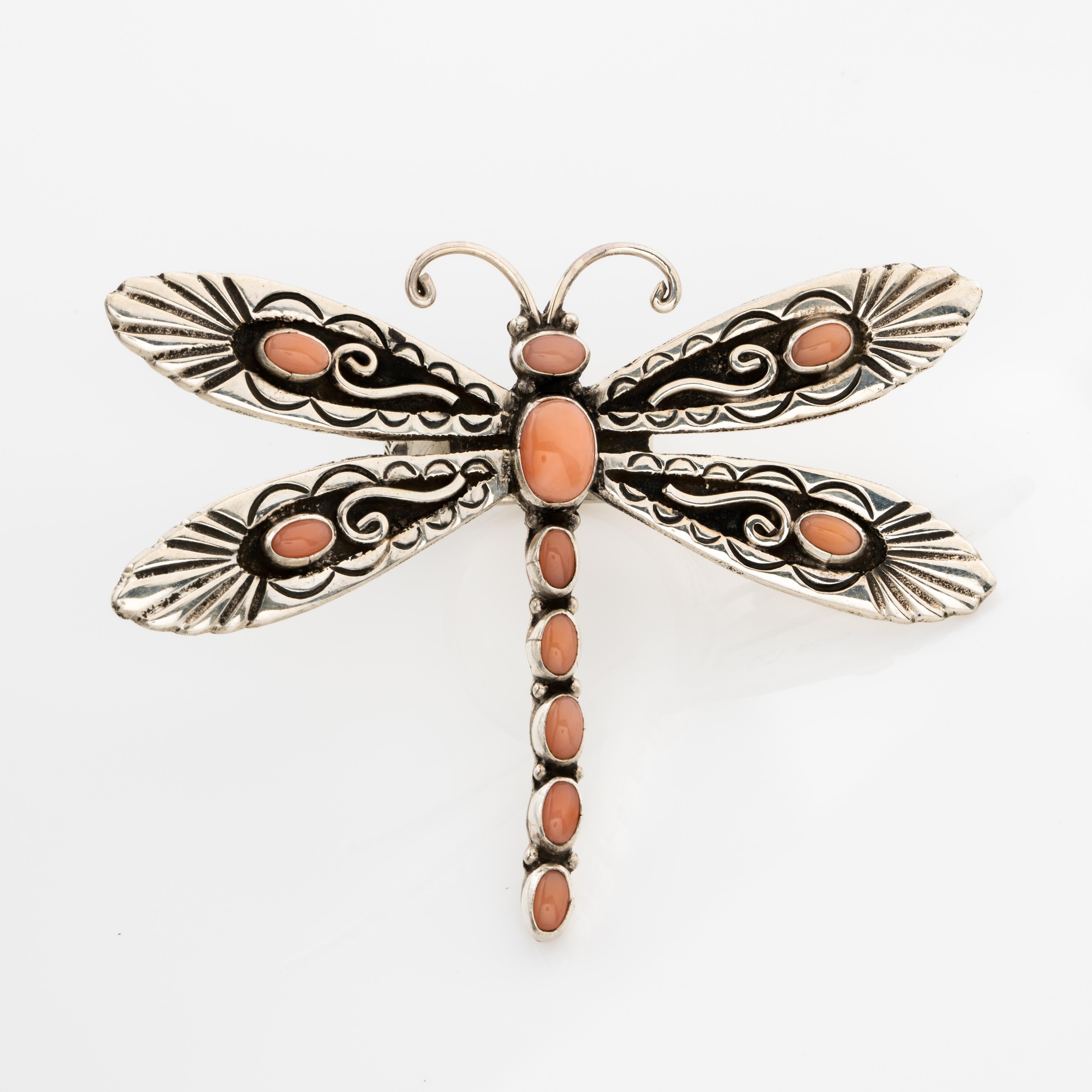 Signed Lee Charley JR Large Navajo Sterling Silver and Coral Dragonfly Statement Ring
Hand engraved and exquisitely articulated. A wonderful substantial statement ring!
Size US 7.5-8
25.37 Grams
Length from top of Dragonfly: 54.98mm
Width from top