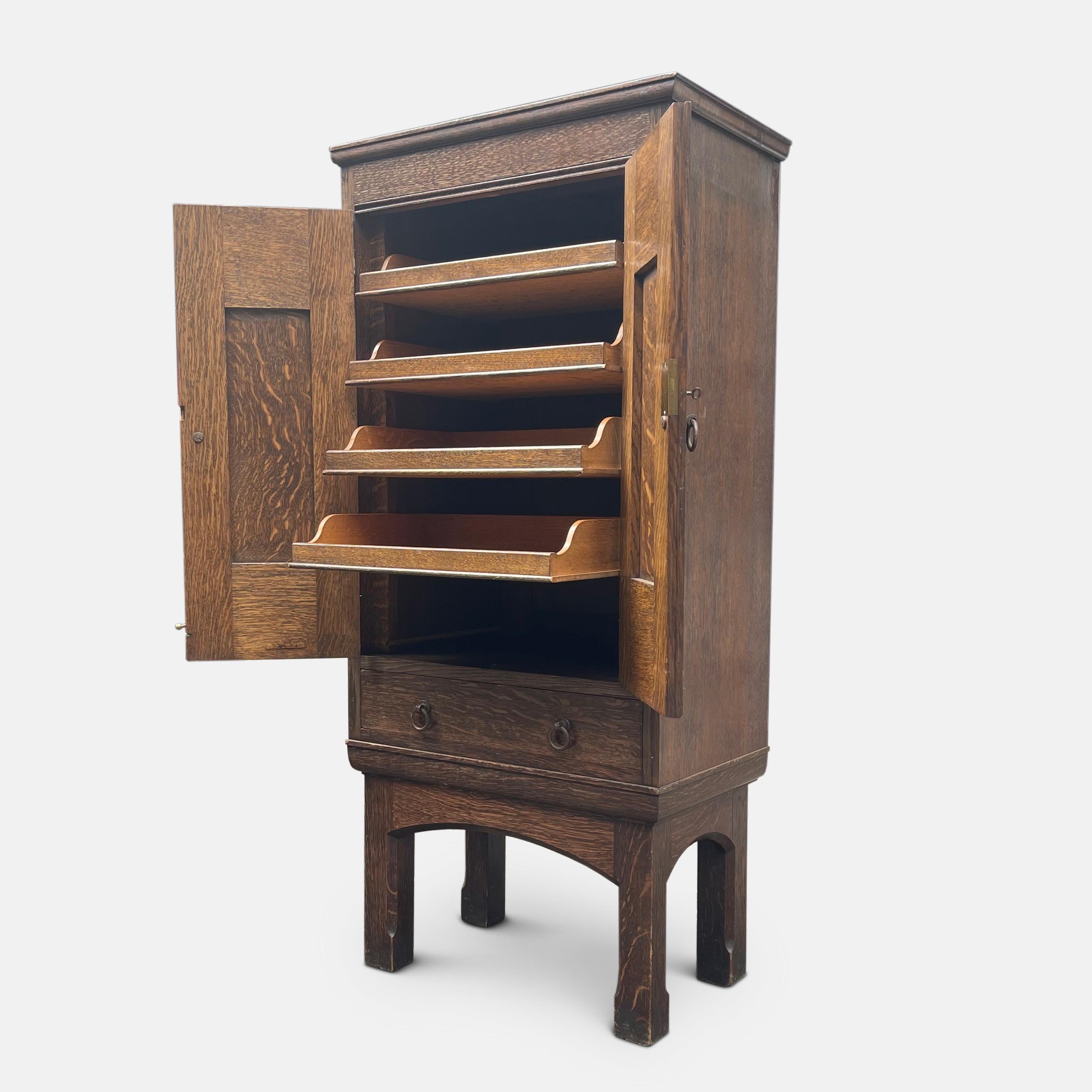Early 20th Century Signed Liberty & Co. Oak Arts and Crafts Cabinet For Sale