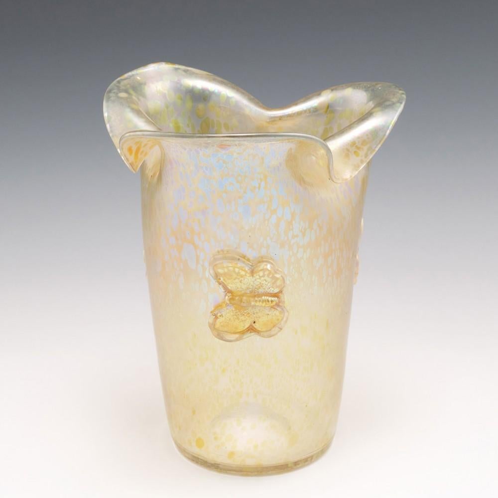 Signed Loetz Candia Papillon Iridescent Vase, c1910

Additional information:
Date : c1910
Origin : Austria
Bowl Features : Applied butterflies on each of three crimped sections
Marks : Incised signature on polished pontil Loetz Austria
Type : Candia