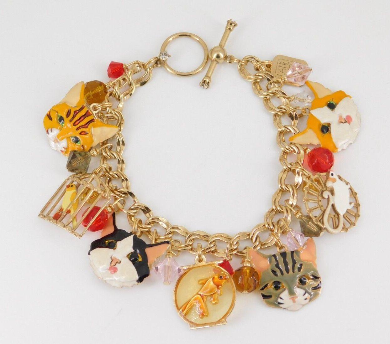 Simply Delightful! Vintage Statement Signed Lunch at the Ritz 2GO Hungry Tabby Cat Bracelet. Brimming with Multi Charms, featuring Enamel Cats, Bird in a Birdcage, Cat in a Fish Bowl and a Mouse on a Spin Wheel. Toggle clasp. Charms and beads vary