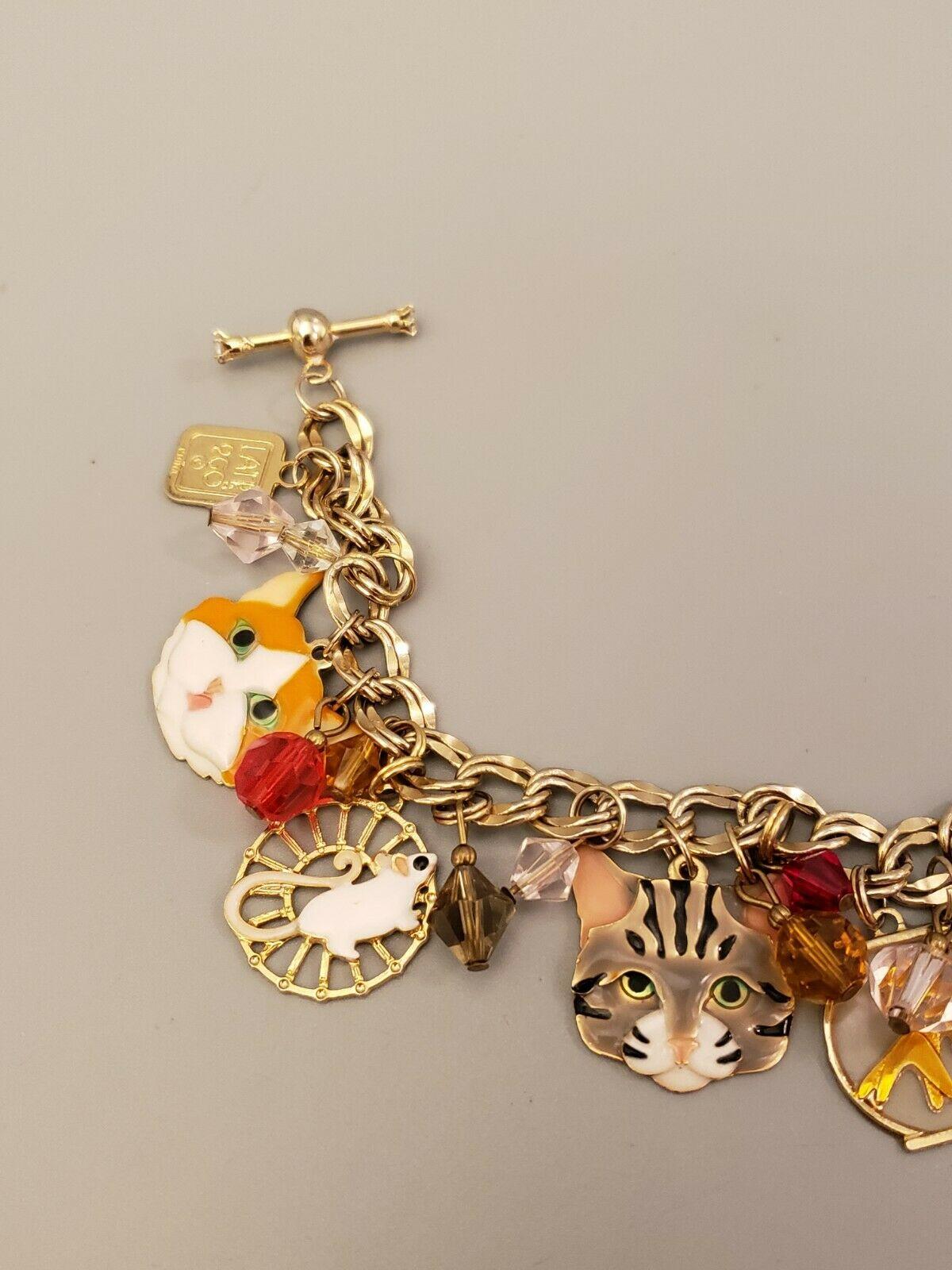 Contemporary Signed Lunch at the Ritz Multi Charm Cats Mouse and Bird in Gilt Cage Bracelet 