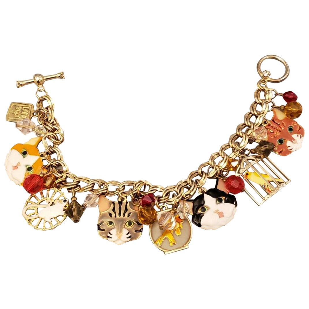 Bracciale firmato Lunch at the Ritz Multi Charm Gatti Topi e Uccelli in Gabbia Dorata in vendita