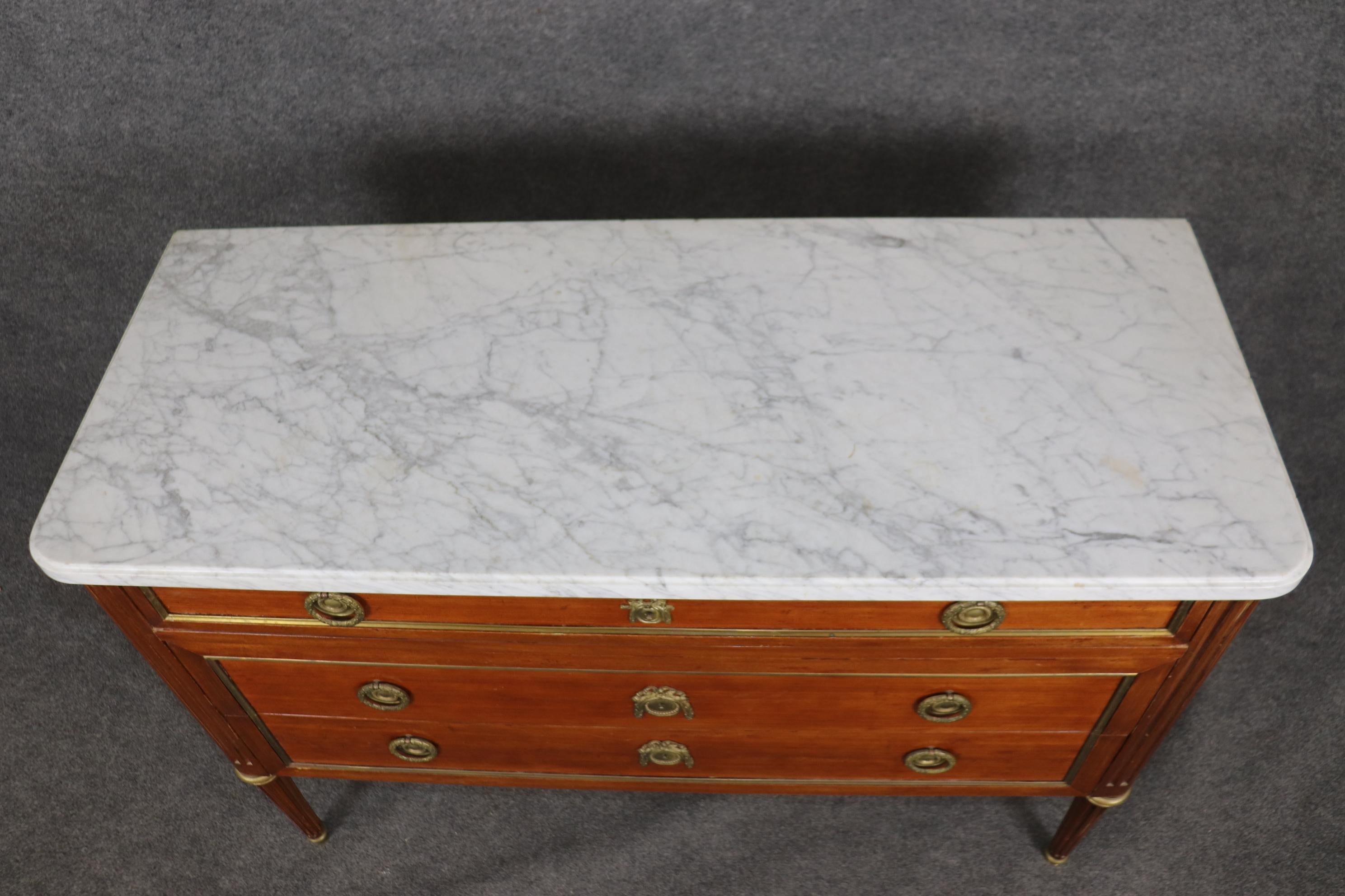 This gorgeous, commode is the most elegant and yet chic piece of its kind, in good vintage condition with no major issues regarding condition other than normal signs of age and minor wear. The piece is French and dates to the 1950s era.  Measures
