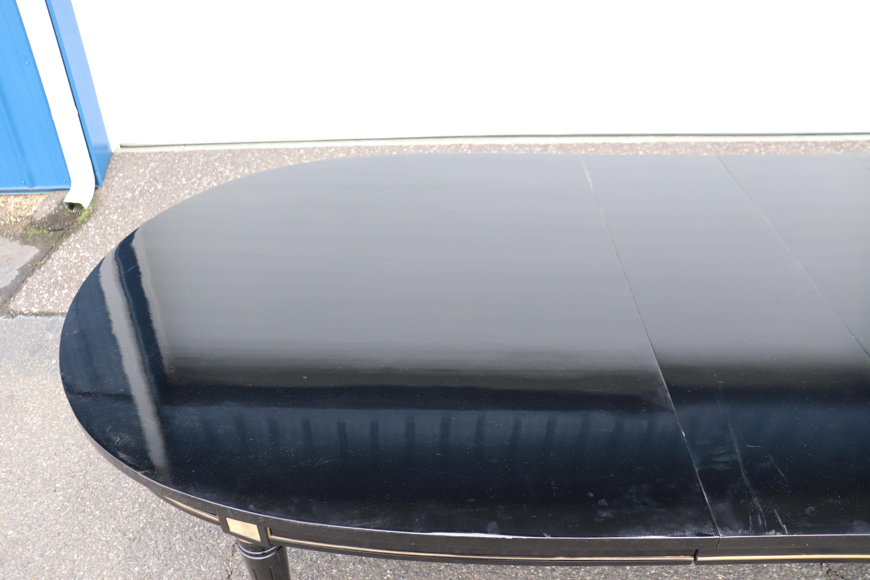 Signed Maison Jansen Ebonized Black Lacquer Dining Table Brass Trim w 2 Leaves For Sale 1