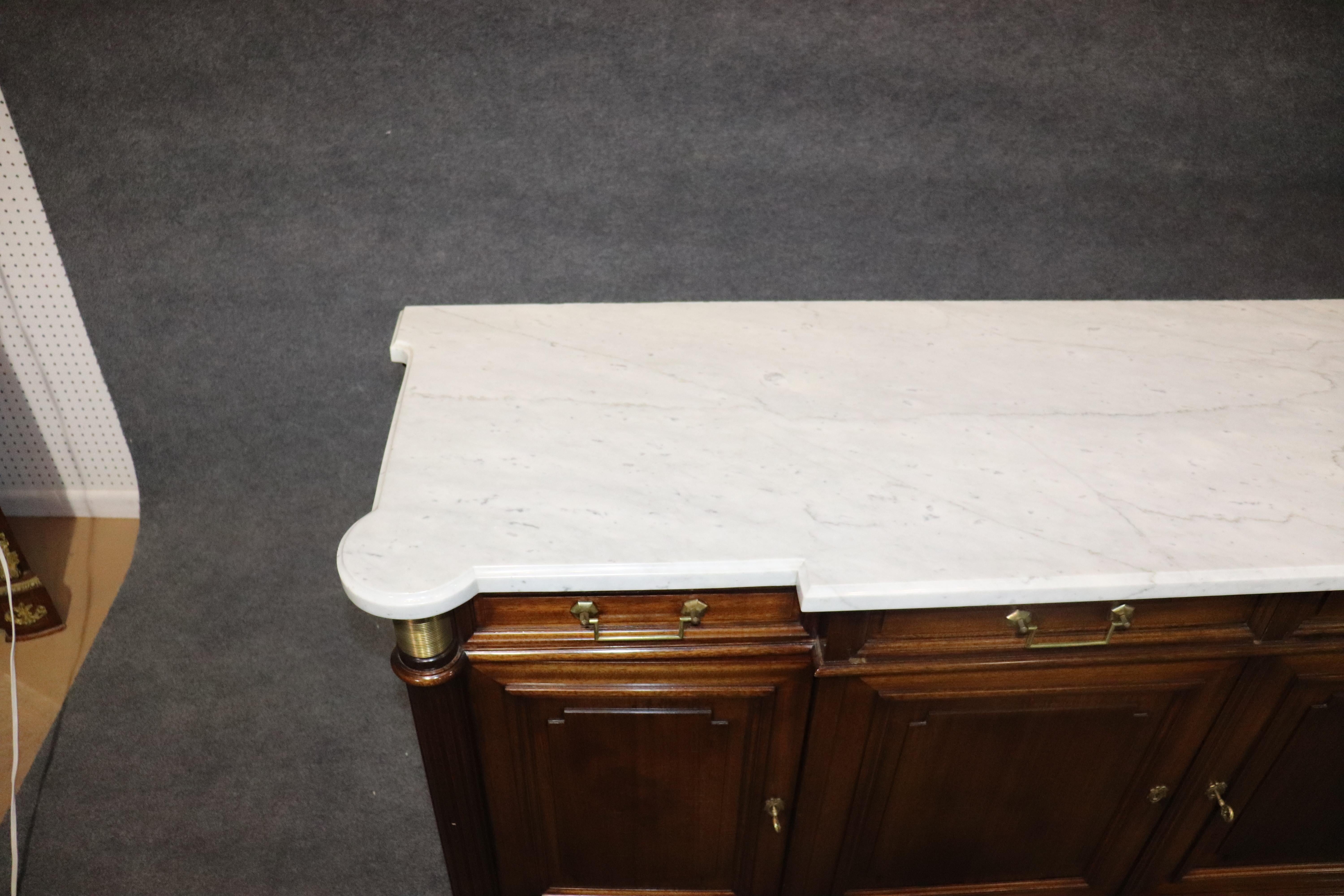 Mid-20th Century Signed Maison Jansen White Marble-Top Plum Pudding Mahogany Sideboard Buffet