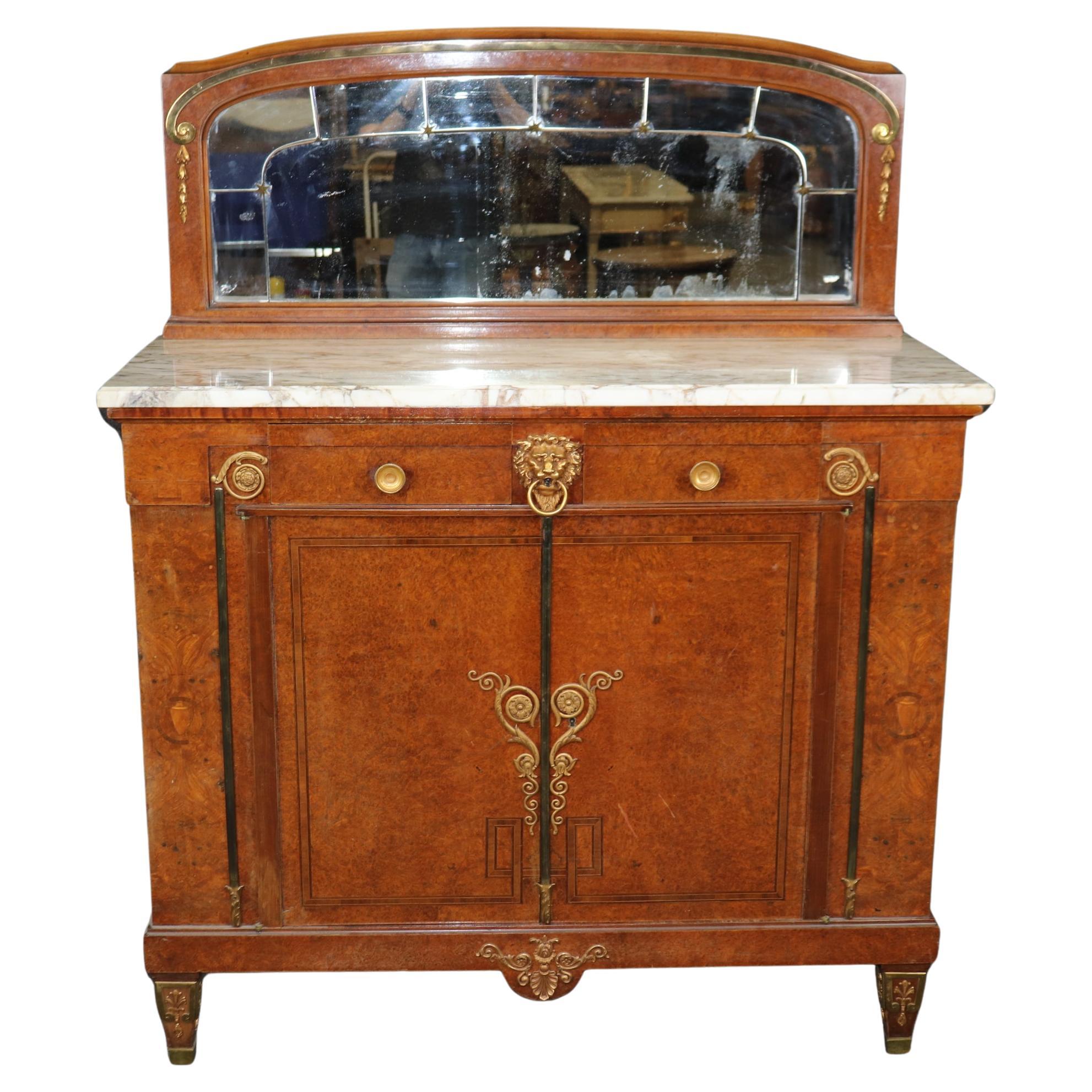 Buffet signé Maison Krieger of Paris, en noyer ronceux, avec miroir et monture en bronze