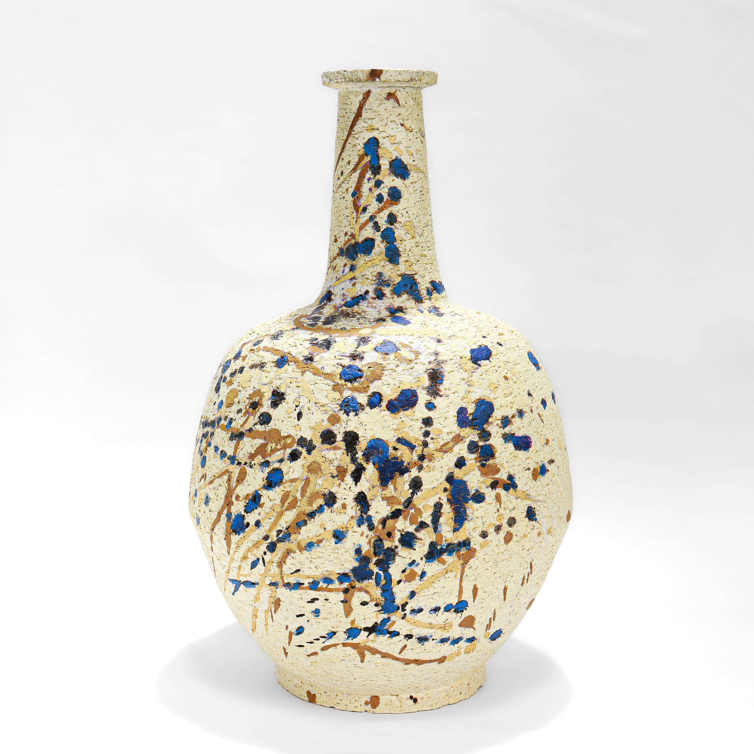 A fine Mid-Century Modern pottery vase.

By Marcello Fantoni for Raymor.

With an angular body, narrow neck, and a flat disc top. 

Made with cream refractory/fire earthenware (that is remiscent of and blends well with travertine) and decorated with