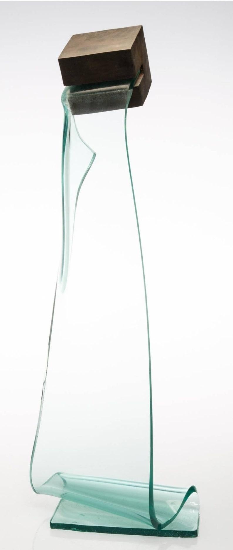 A rare and spectacular freestanding American Post-Modernist industrial slumped glass and bronze sculpture by Mary Shaffer (United States, b.1947) Cube #9. circa 1991.  

Materials: Glass, bronze
Tall / Large floor standing

Dimensions:
33