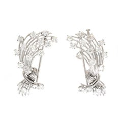 Paire de Clips en Platine et 18k signée Mauboussin Paris