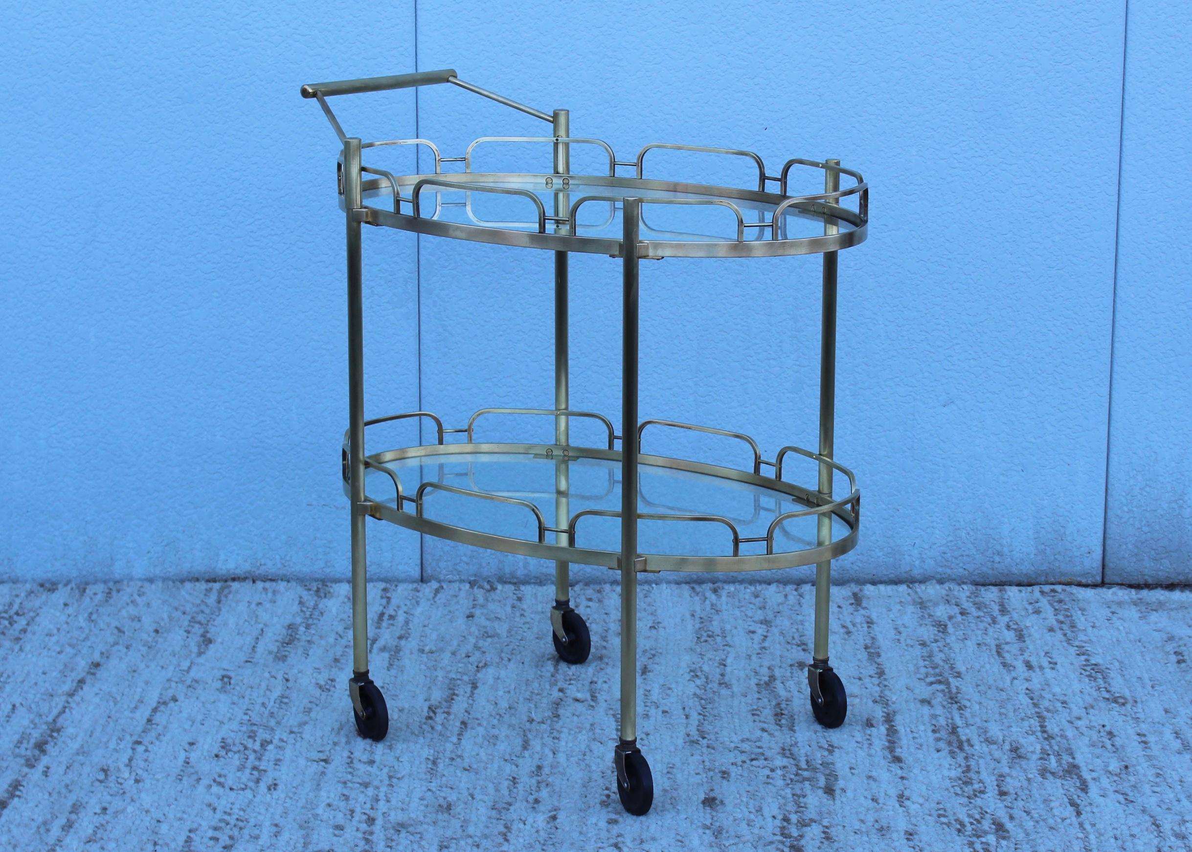 1950s solid brass signed patinated brass bar cart by Maxwell-Phillip.