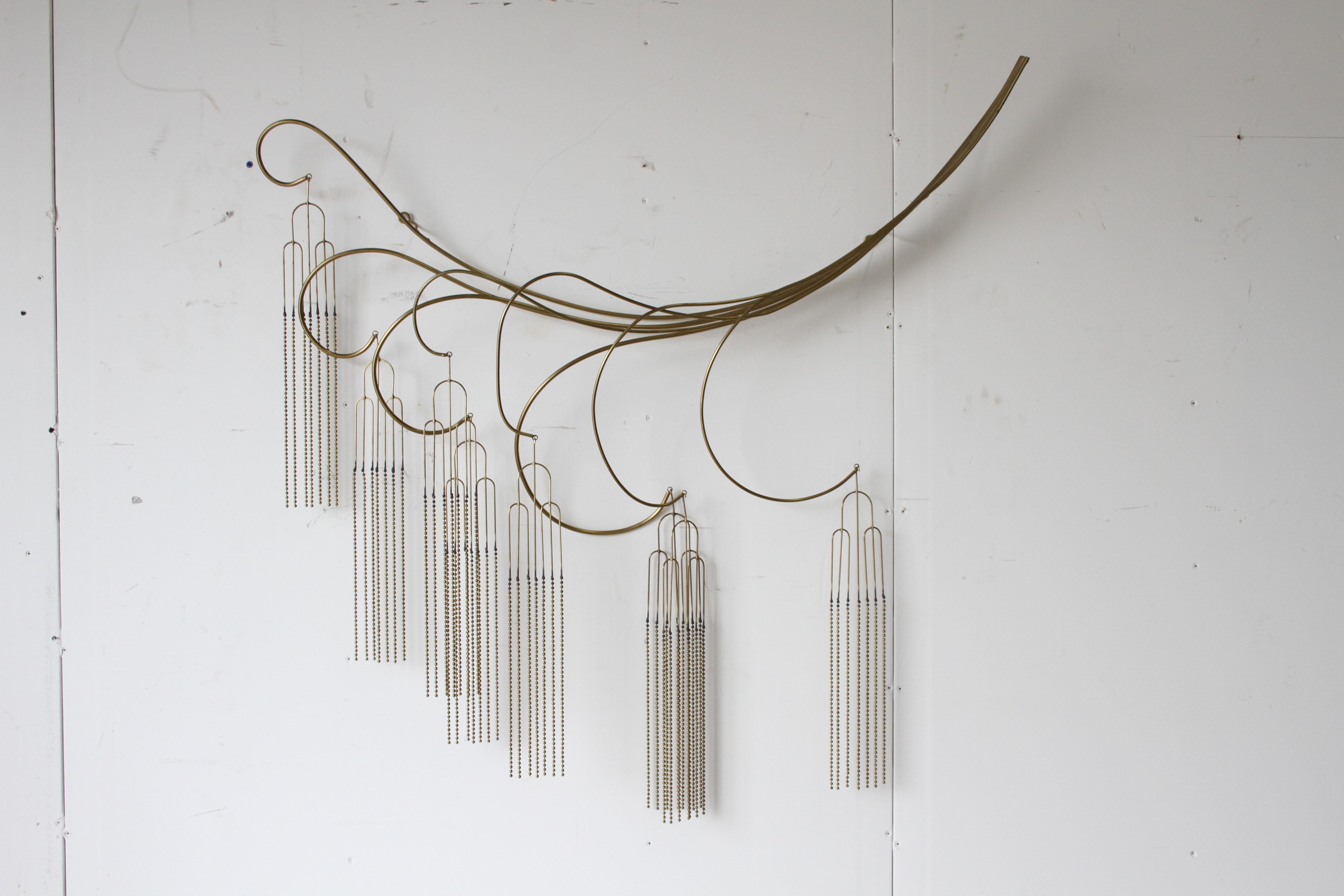Large Curtis Jeré brass plated willow tree wall sculpture with draping brass beads. Signed 
C. Jeré 1984. It is possible to hang this vertical, rather than horizontal. Minor rust to some areas, otherwise very nice. Rarely seen design. 

