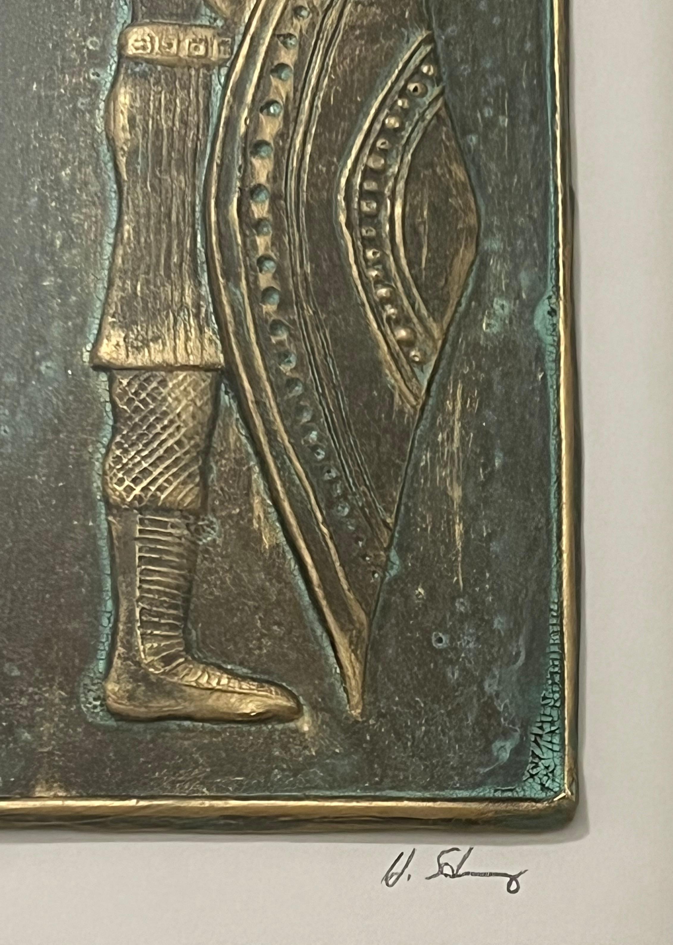 Rare Mid Century framed ceramic wall sculpture titled “Warrior I” by famed artist Harris Strong (1920-2006).  Stunning tile art depicting a bearded warrior holding a shield. The sculpture has been painted in gold leaf.  The piece is accentuated by