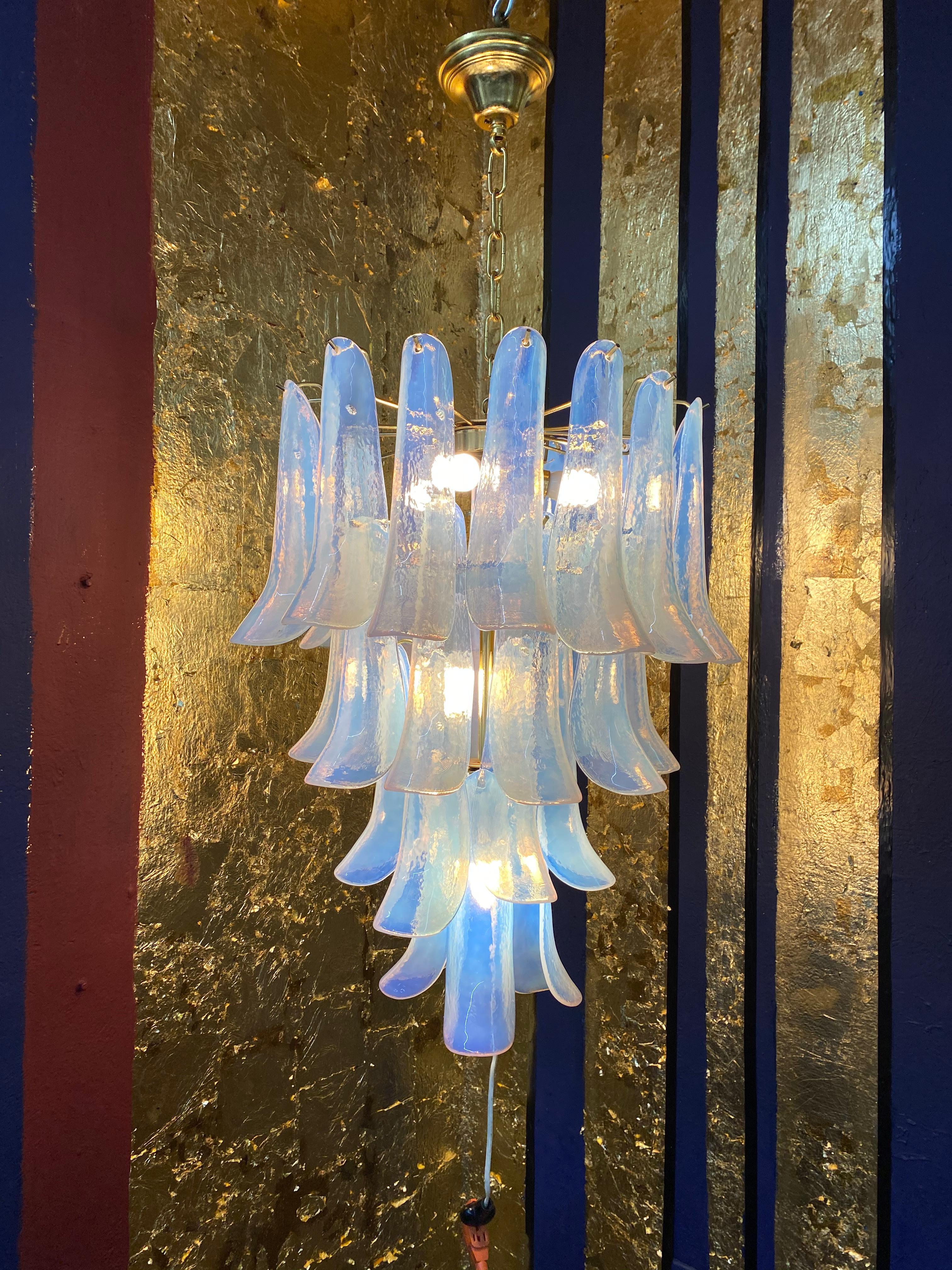 Beautiful six-light chandelier in opalescent Murano glass by La Murrina, every glass element bears a 