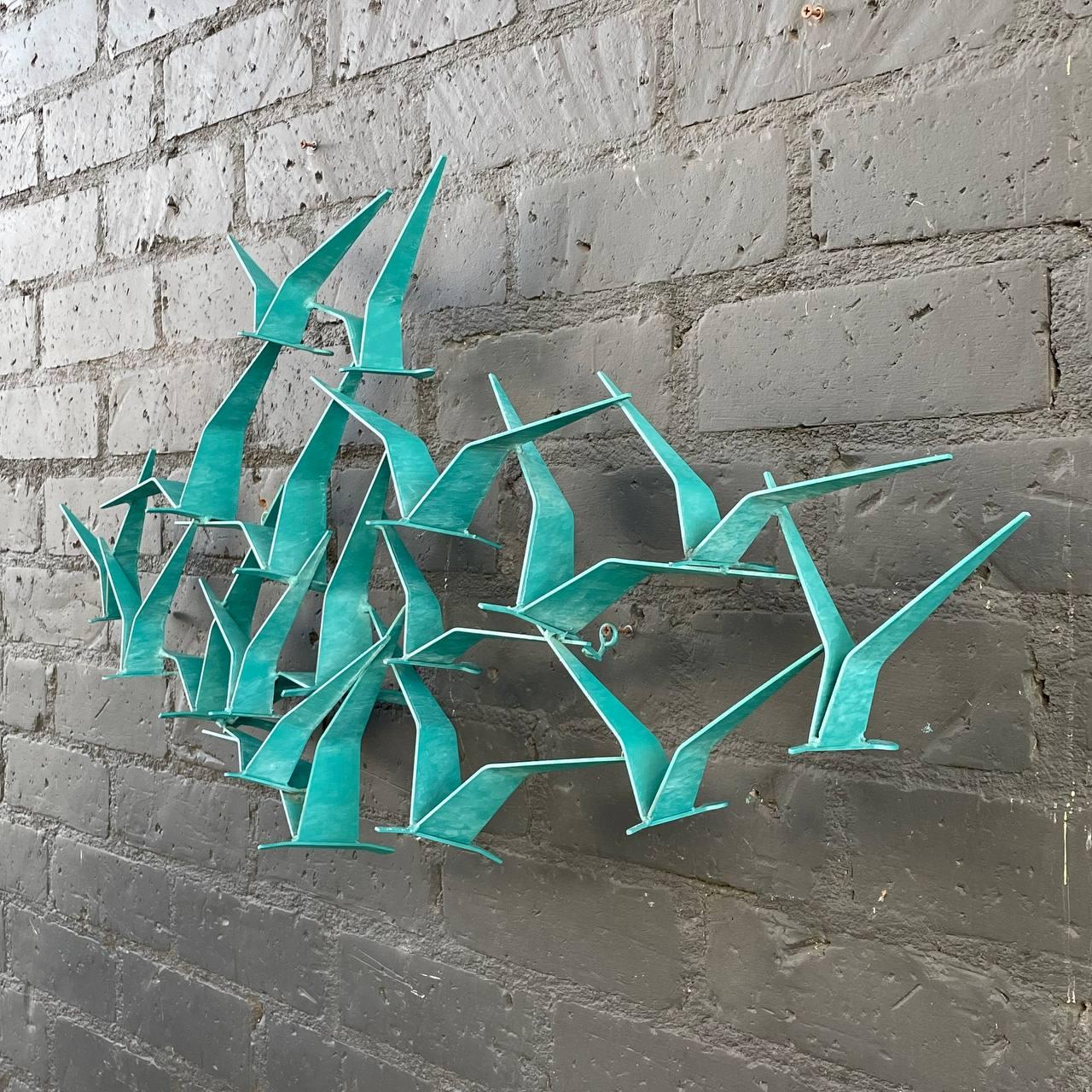 Signed Mid-Century Modern “Flock of Birds” Wall Sculpture by Curtis Jere

Original Vintage Condition
Materials: Original Painted Metal

Dimensions: 21”H x 44.50”W x 5.50”D