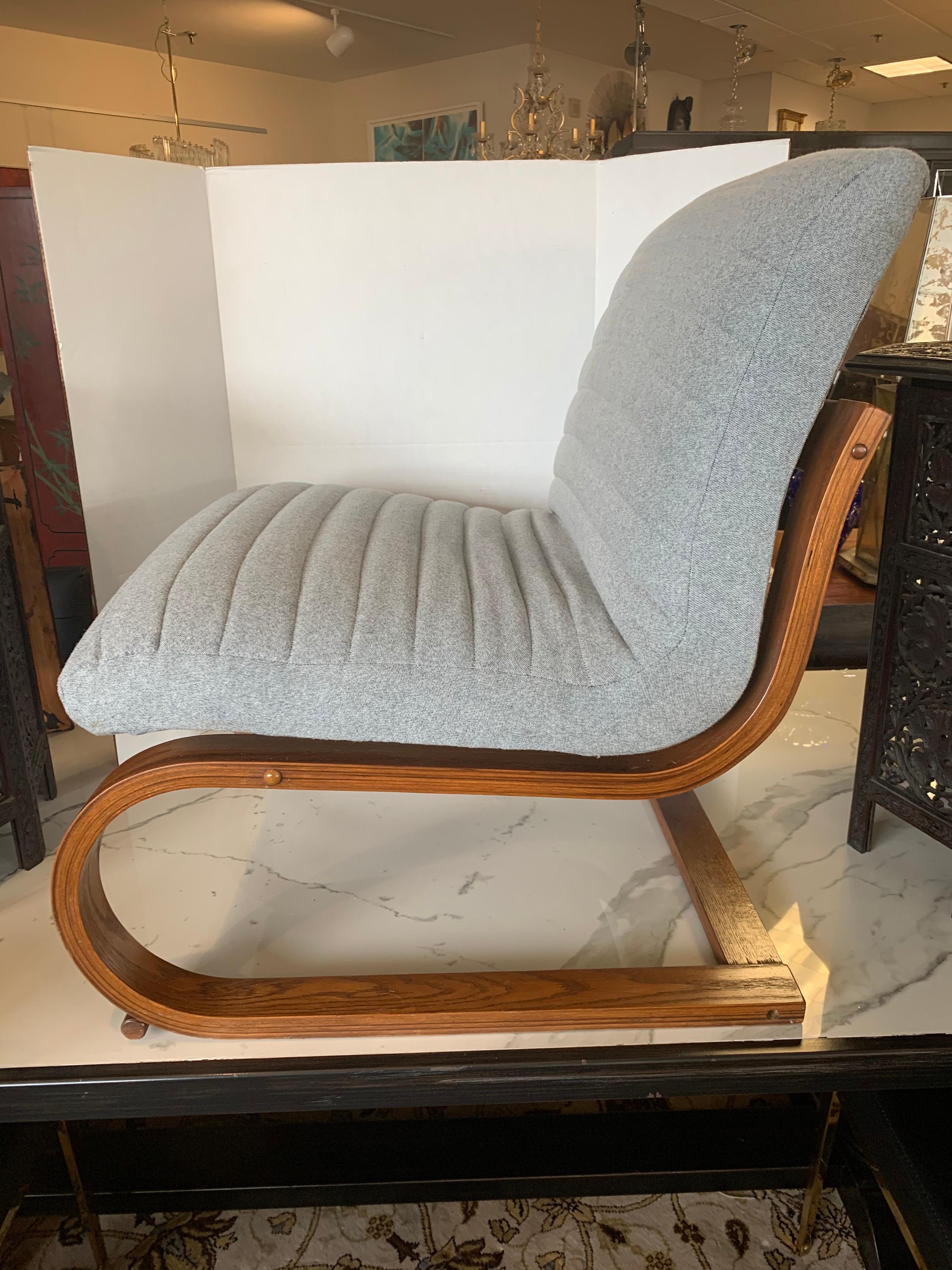 Stunning, newly upholstered in gray Herman Miller fabric, bentwood lounge chair by Charlton, USA,
circa 1970s with iconic lines and scale and the oh so coveted bentwood curves.
Seat height is 16 inches and all other dimensions are below. Features