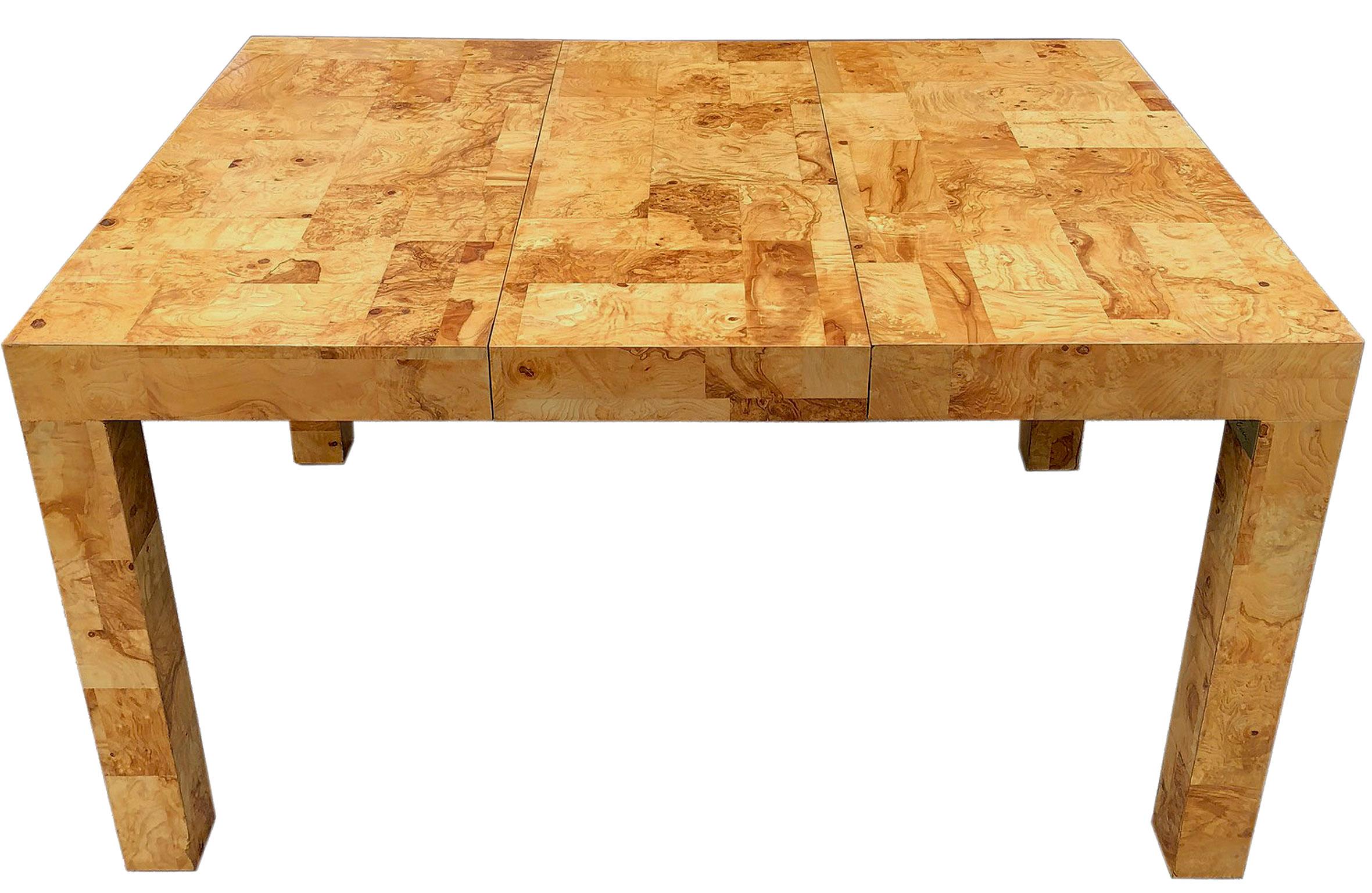 Top of the line handcrafted burlwood table. Other designers produced burl Parsons tables such as Milo Baughman and Leon Rosen however, Paul Evans added his signature patchwork design that really stands out above the rest.

A nice size that could