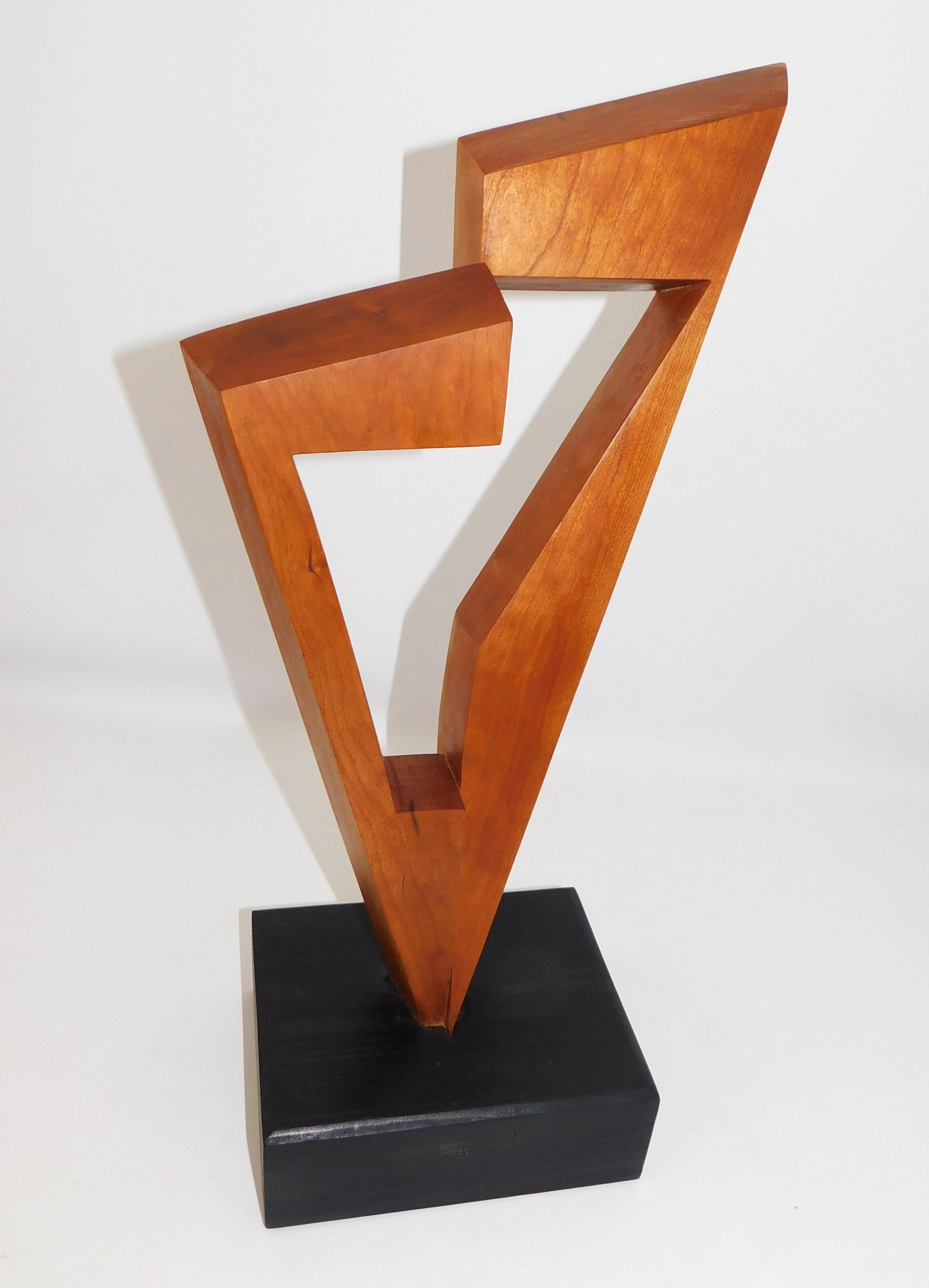This contemporary abstract wooden sculpture was done by Czeslaw Budny a Polish-Canadian artist in the constructivist style circa 2019. This sculpture was made entirely of up-cycled, reclaimed wood from a variety of sources and utilizes the