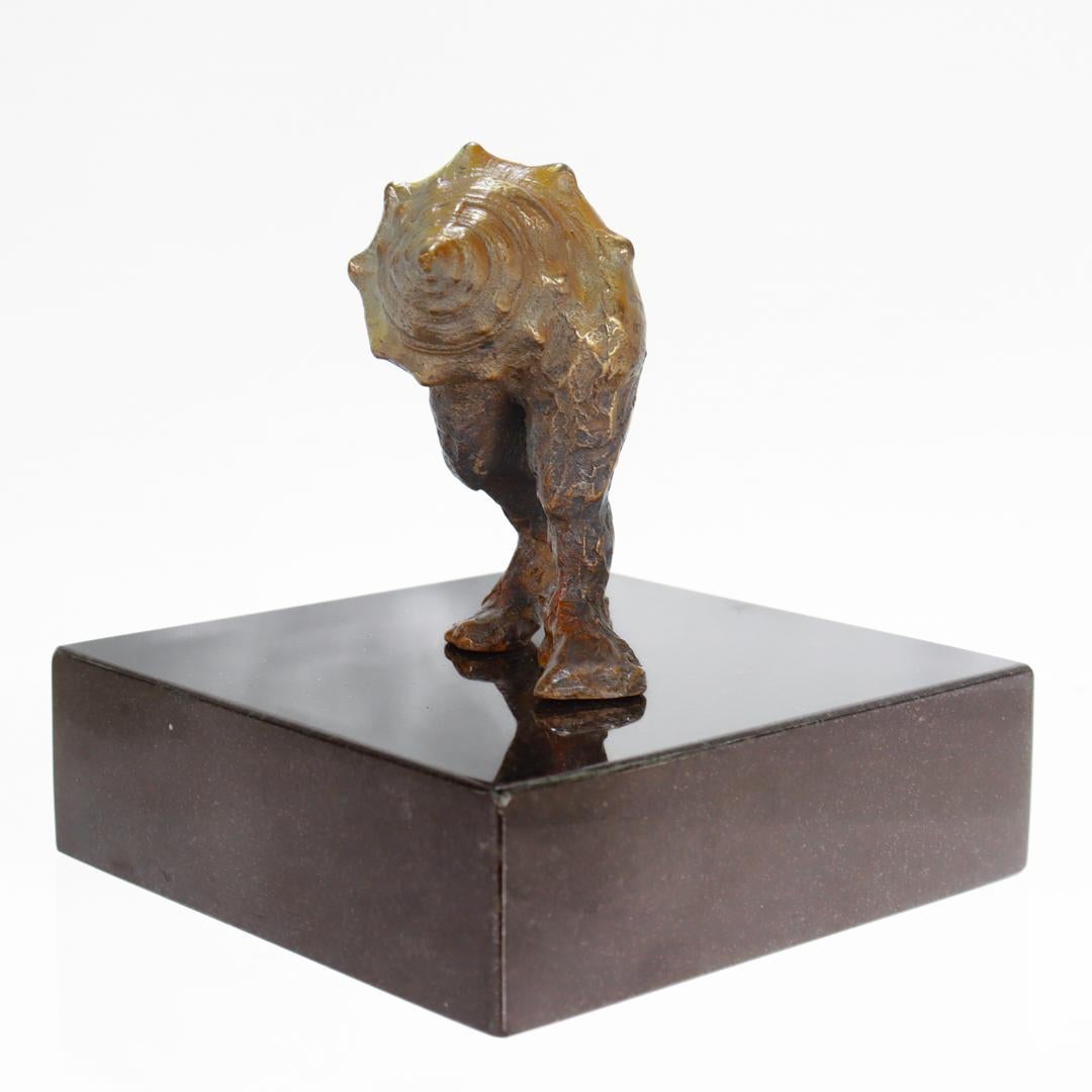 20th Century Signed Modernist Surreal Bronze Sculpture of a Walking Conch Shell with Leg For Sale