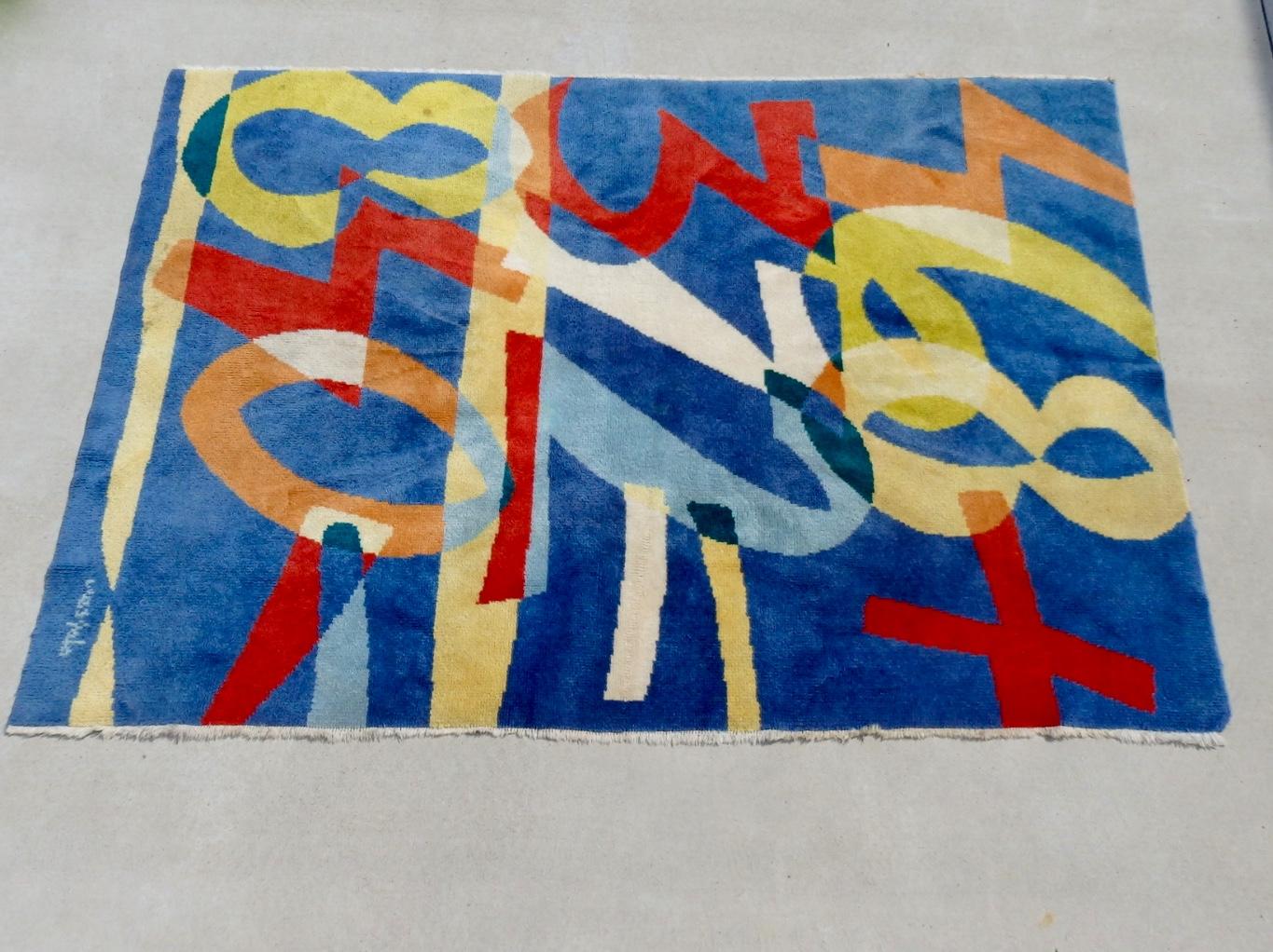 Modernist area rug with vivid numerical theme colors. Rug is signed and shown but signature is illegible to me.