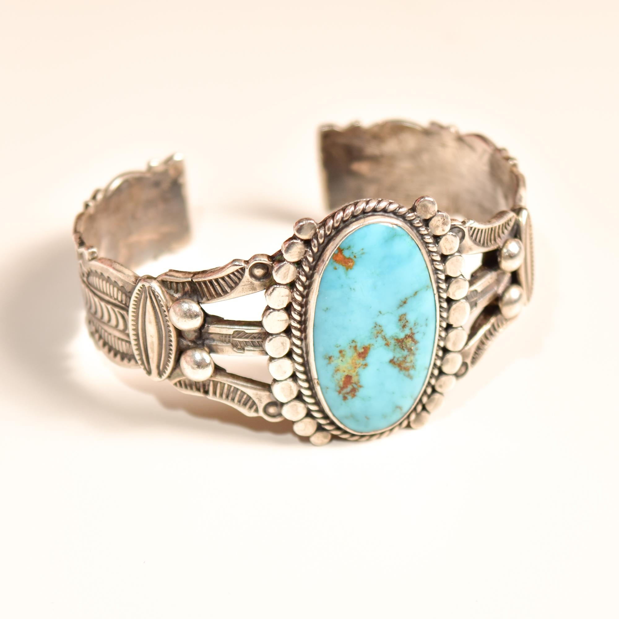An incredible signed Morris Robinson hopi turquoise cuff. Morris Talawytewa Robinson, a master Native American gold and silversmith during the 20th century, is renowned for his beautiful hand-crafted jewelry. This bracelet is an exceptional example