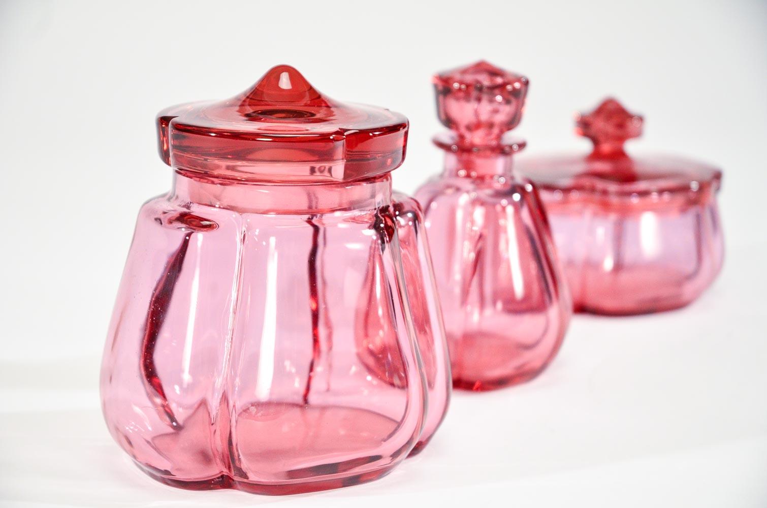 One of Moser's iconic named colors, this signed 3-piece dresser set is hand blown crystal in 