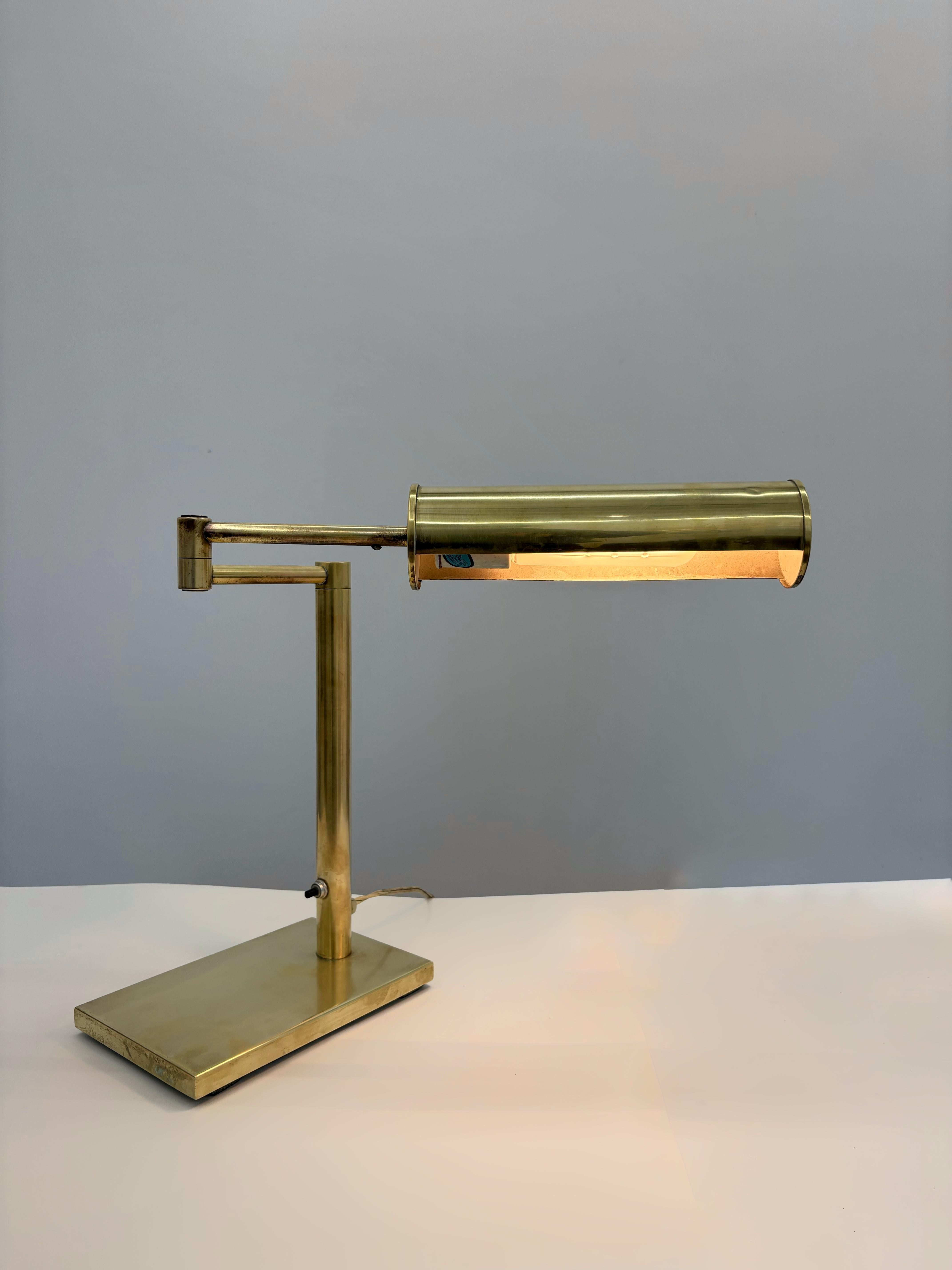 Mid-Century Modernist Articulating Brass table lamp with makers tag. By Walter Von Nessen

An iconic Mid-Century Modern design, this Brass Swing Arm Table Lamp by Walter Von Nessen for Nessen Studio (circa 1970s, New York) seamlessly merges