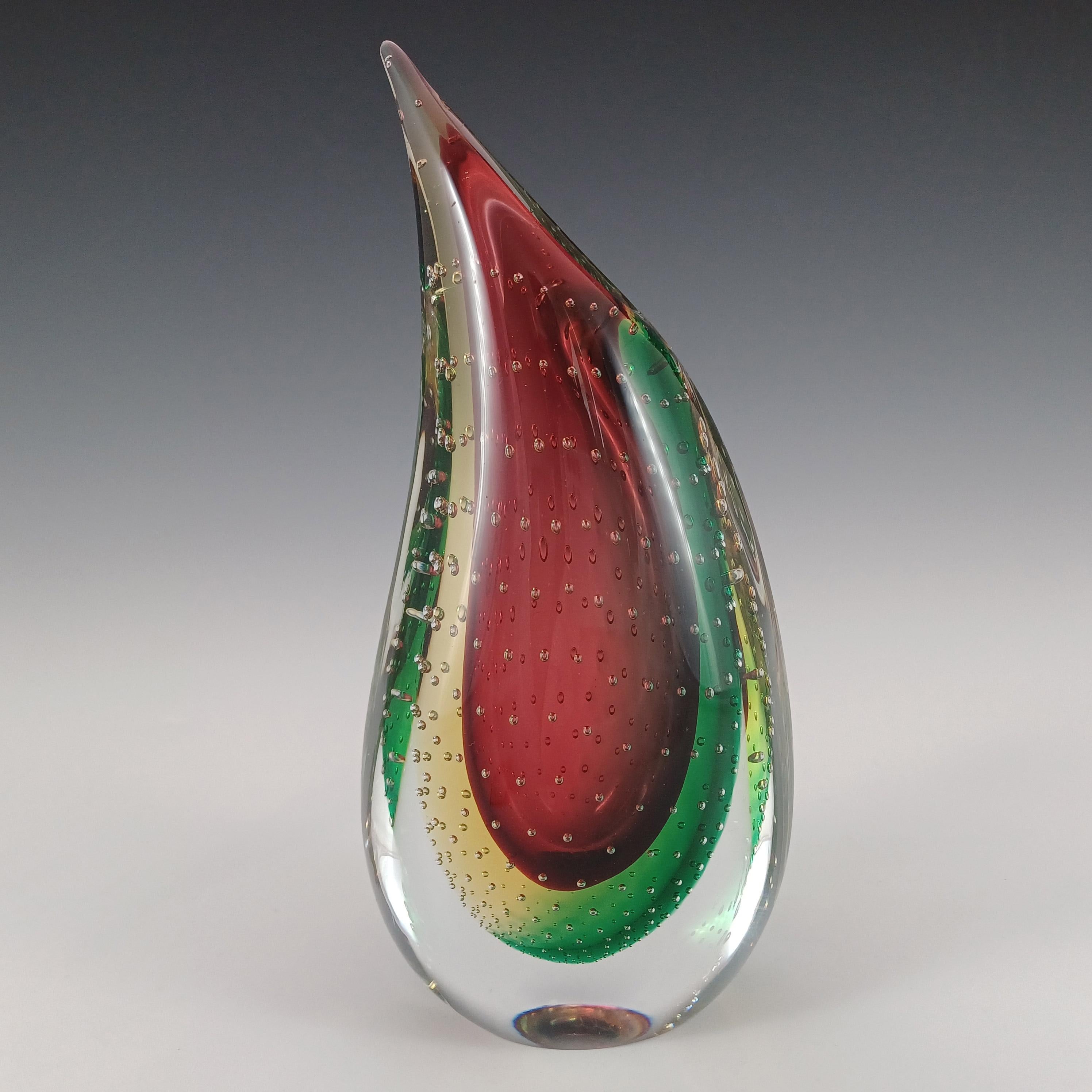 Here is a wonderful Venetian glass organic shaped vase. Made on the island of Murano, near Venice, Italy, by the Oball glassworks, signed to base Oball, Murano. In a stunning combination of cranberry red glass cased in green & yellow glass, which is
