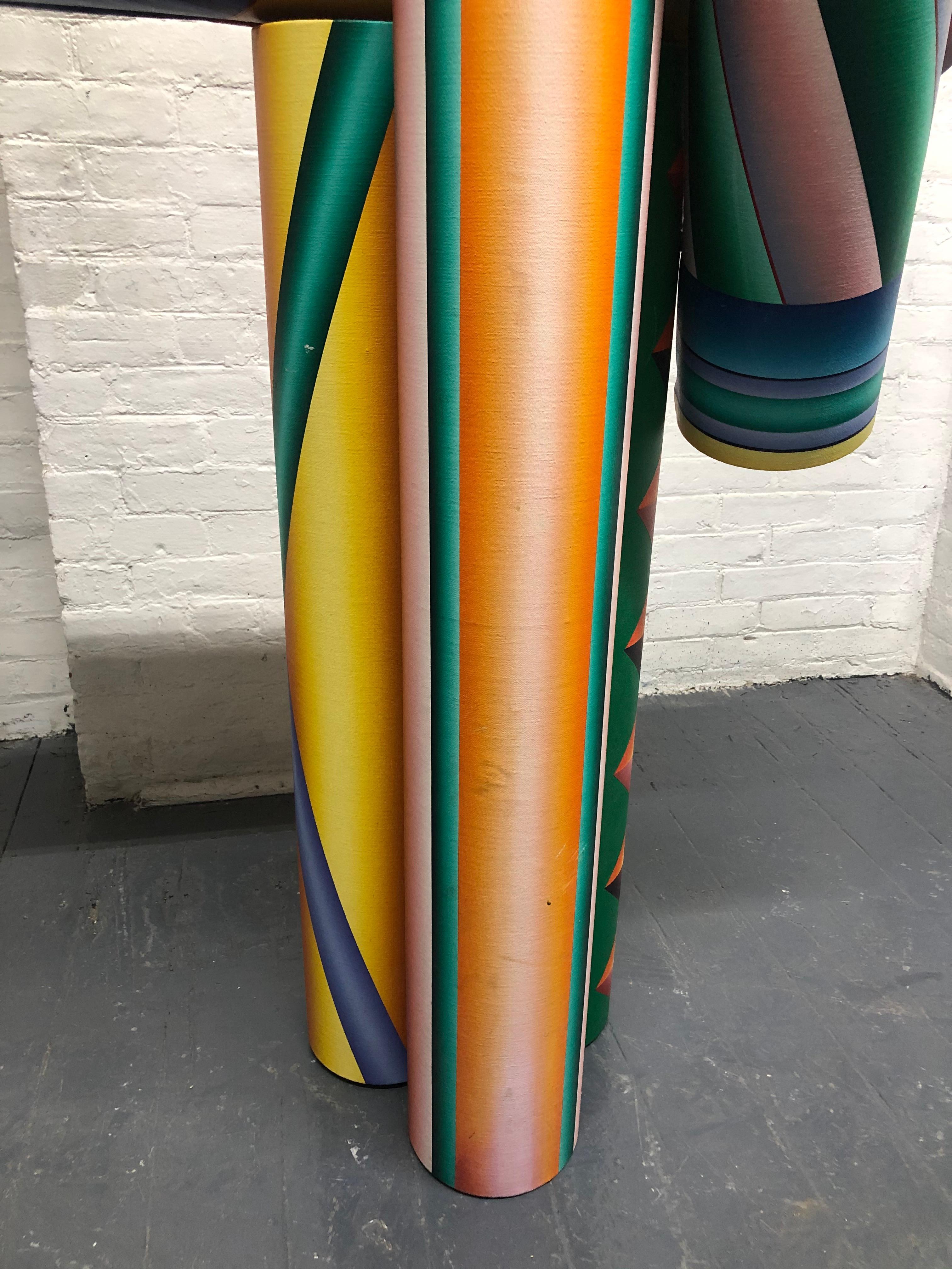 Signed, oil on canvas freestanding cylindrical artwork. This artwork consists of five cylinders and each one is covered with vibrant colors with an abstract pattern of oil on canvas.