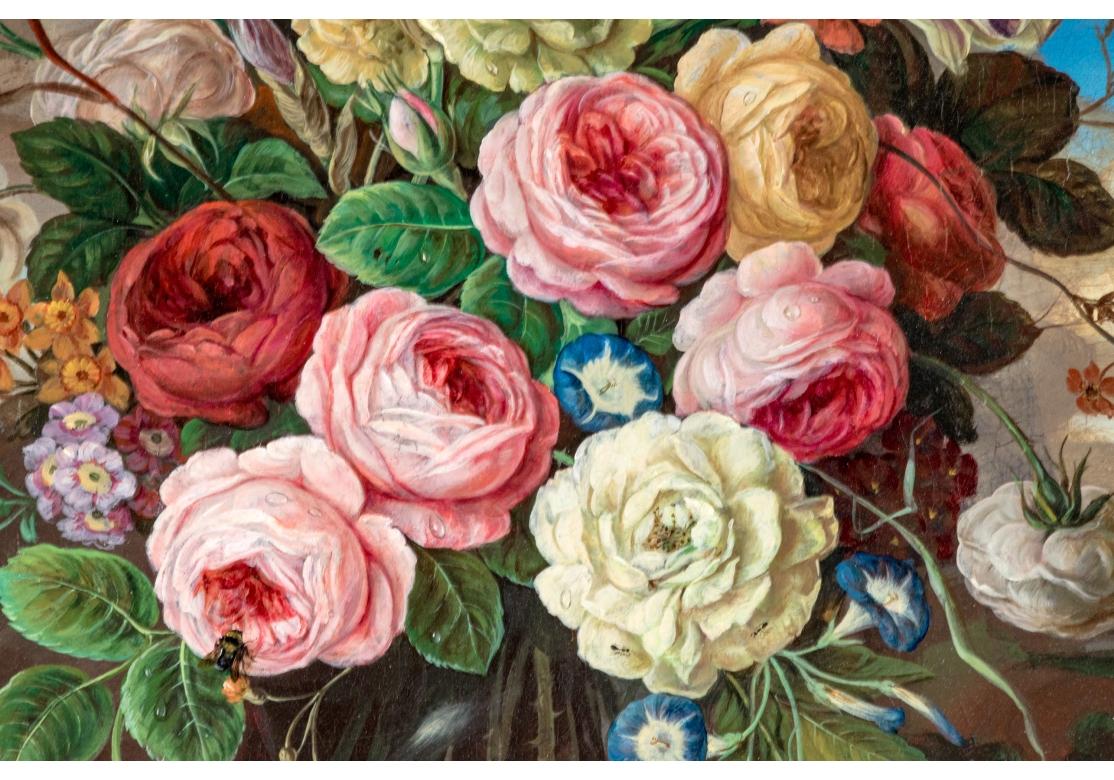 Oil on canvas depicting a colorful floral bouquet with tulips, roses and other garden flowers in Dutch style. Some with dew drops and tiny insects.
Presented in a custom paint decorated and gilt frame with egg/dart and carved foliate corners.
Signed