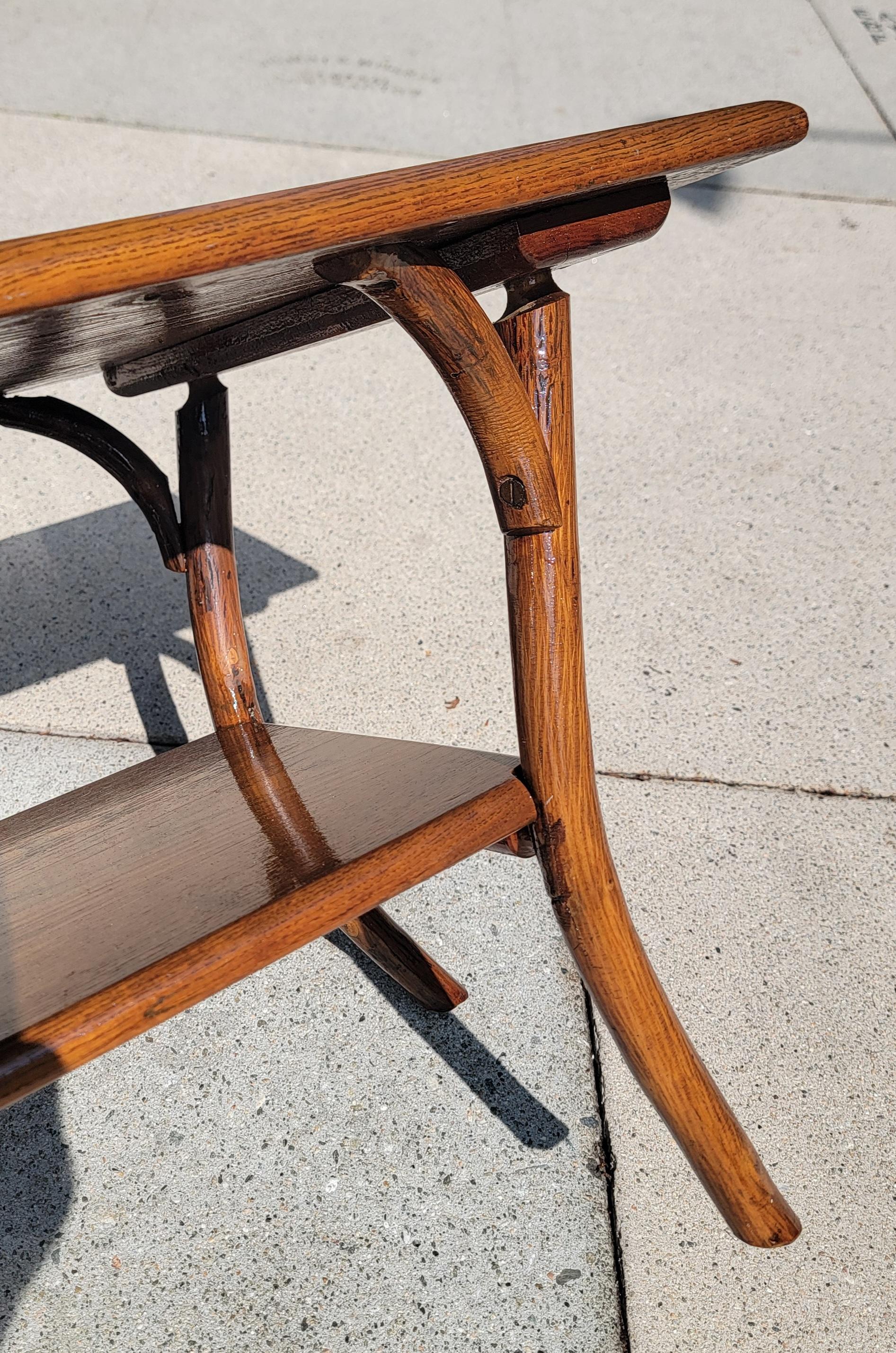 This signed Old Hickory coffee table is in pristine condition and very sturdy.Such unusual form and patina.