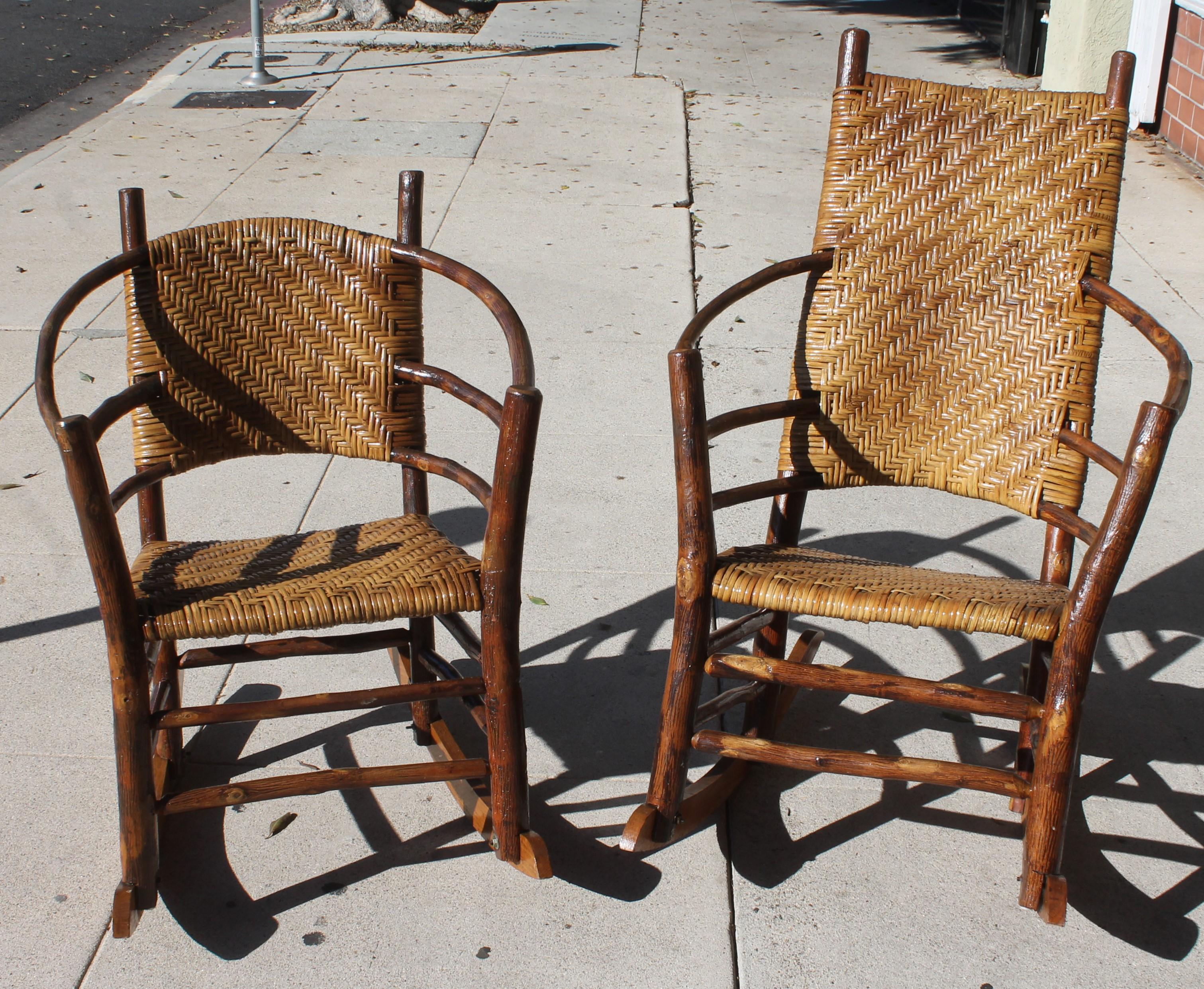 These two amazing stamped Old Hickory Rocking chairs are in fine condition and coated with all weather protector boat varnish for durability. They are in original condition with the original hand woven seats and backs. These were hand crafted at the