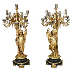 Signed Pair of a. Carrier Belleuse Bronze Figural Candelabras on Slate Bases