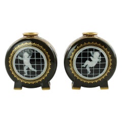 Signed Pair Gilded Mintons Pate-Sur-Pate Caged Putti Footed Moon Flask Vases