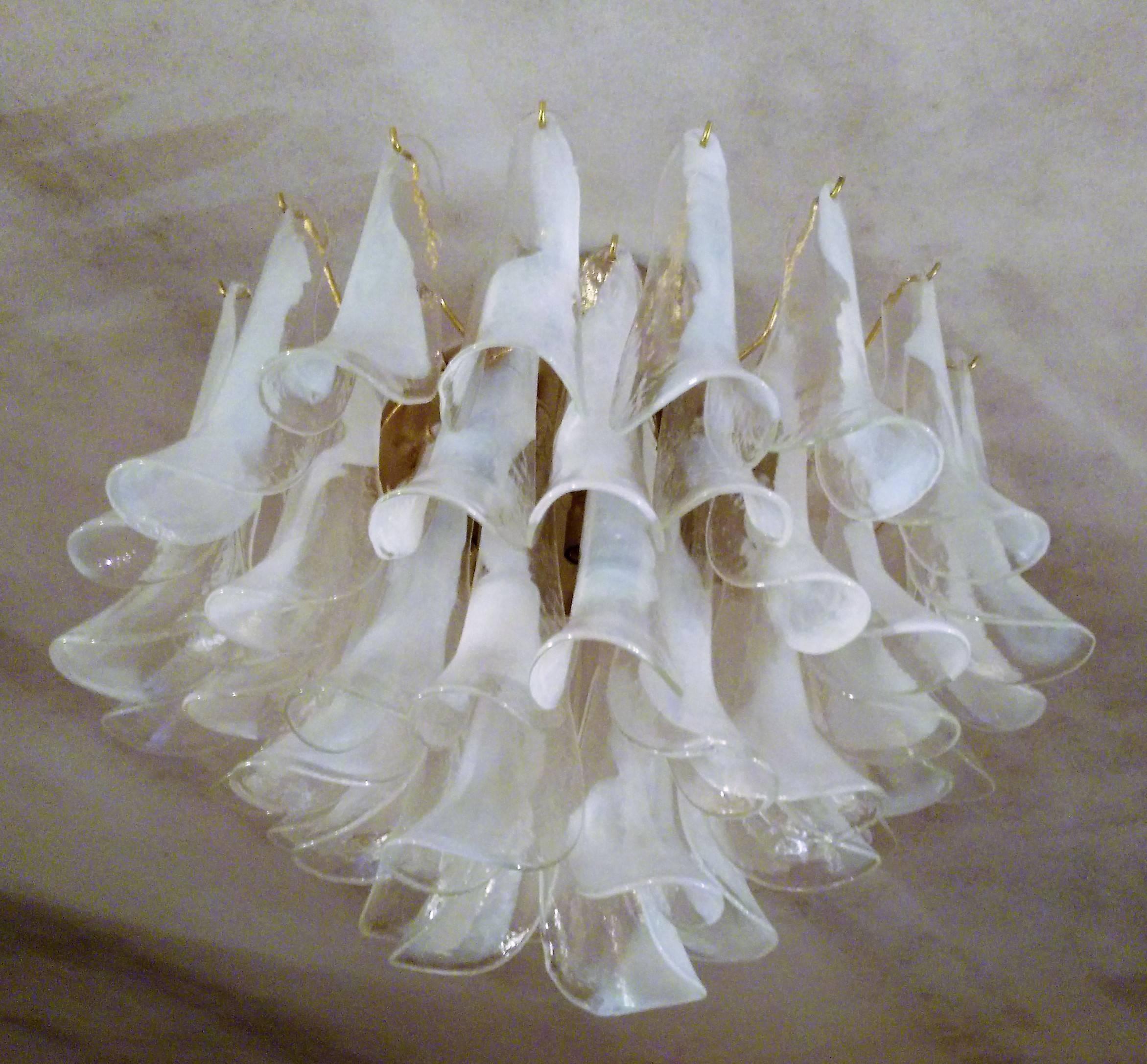 Pair of signed clear and white Murano glass chandeliers by La Murrina, consisting of 52 petals and every one bears a 