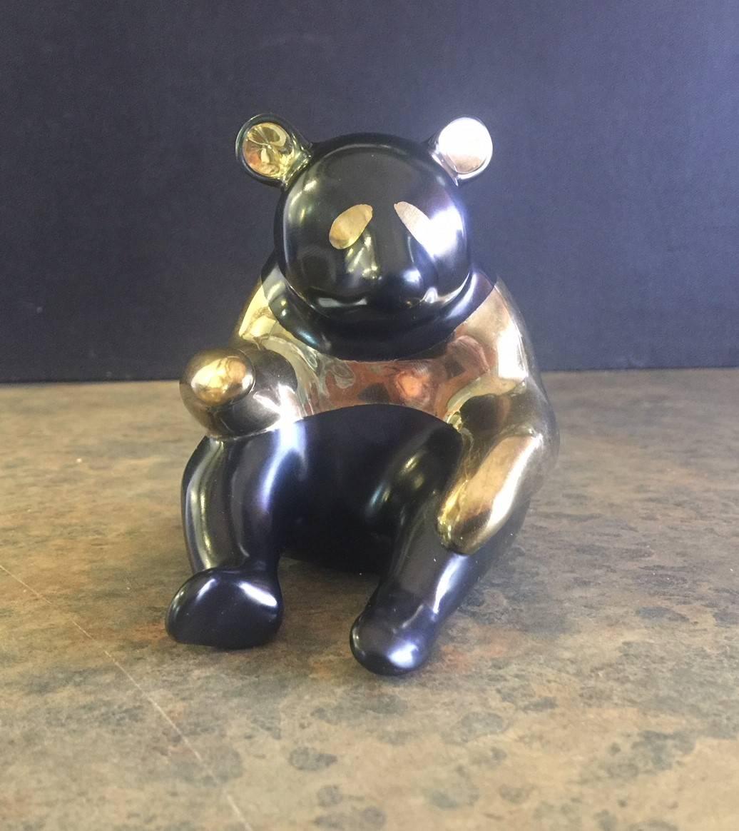 Limited edition (838/2500) signed panda bear figure in bronze with black and gold patina by Loet Vanderveen, circa 1990s. The piece comes with a signed “Certificate of Authenticity”.