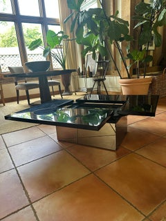 Signed Paul Michel Mid century metamorphic coffee/cocktail table mirrored base