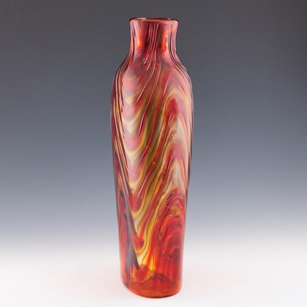 Signed Pavel Hlava Chlum Garnet Glass Bottle Vase, c1975

Made and designed by one of the greatest of all post war Czech glass artists

Additional information:
Date : c1975
Origin : Novy Bor Czechoslovakia, now Czech Republic
Bowl Features : Heat