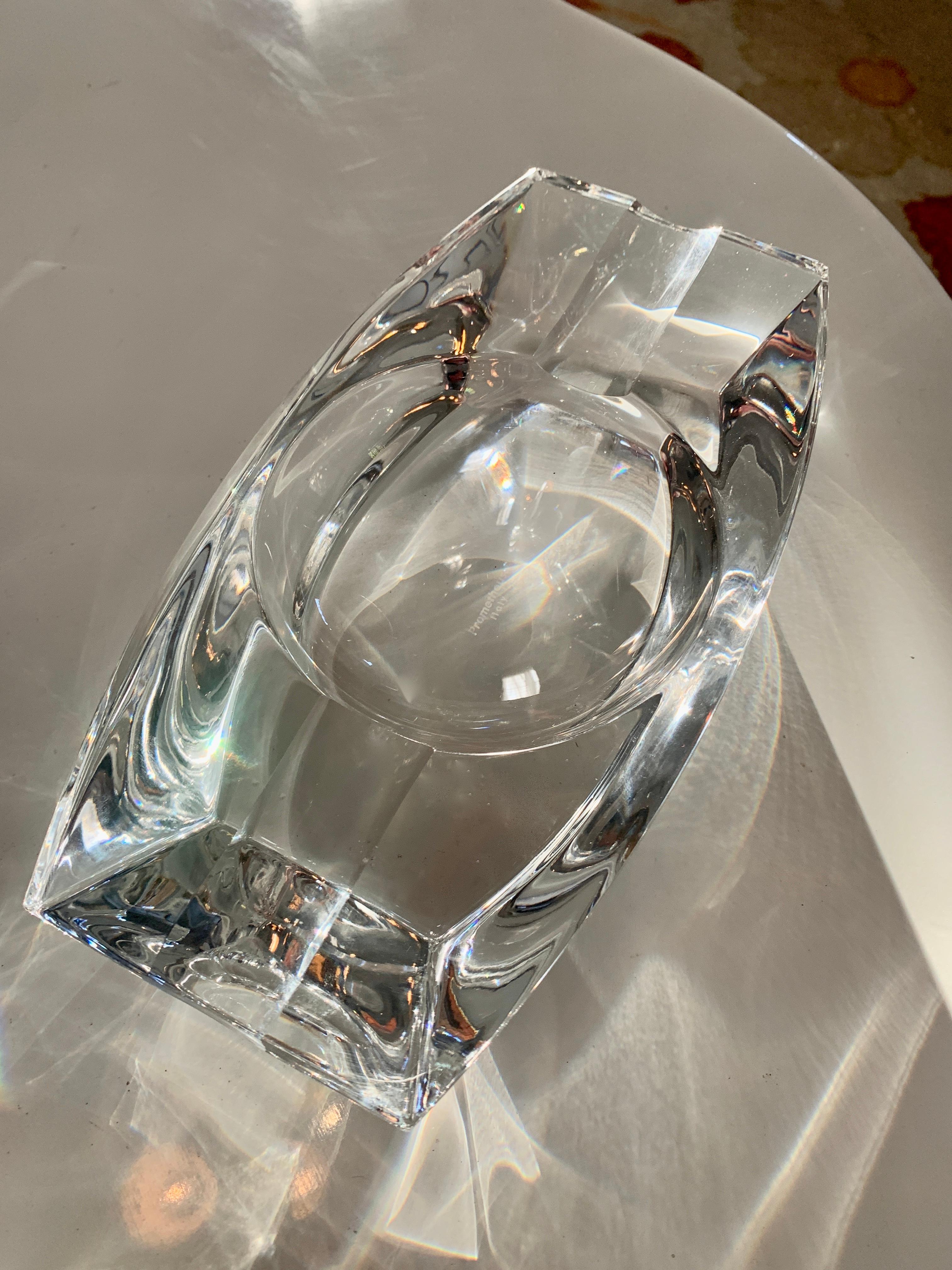 Large and of substantial weight, our Italian cut crystal Mid-Century Modern influenced Cigar ashtray has space for two cigars, or roll a nice 420 blunt, grab a glass and relax!

The facets and cuts of the piece create a show piece that is an