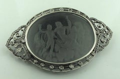 Signed "Putti" Platinum Black Onyx Brooch or Pendant, circa 1920