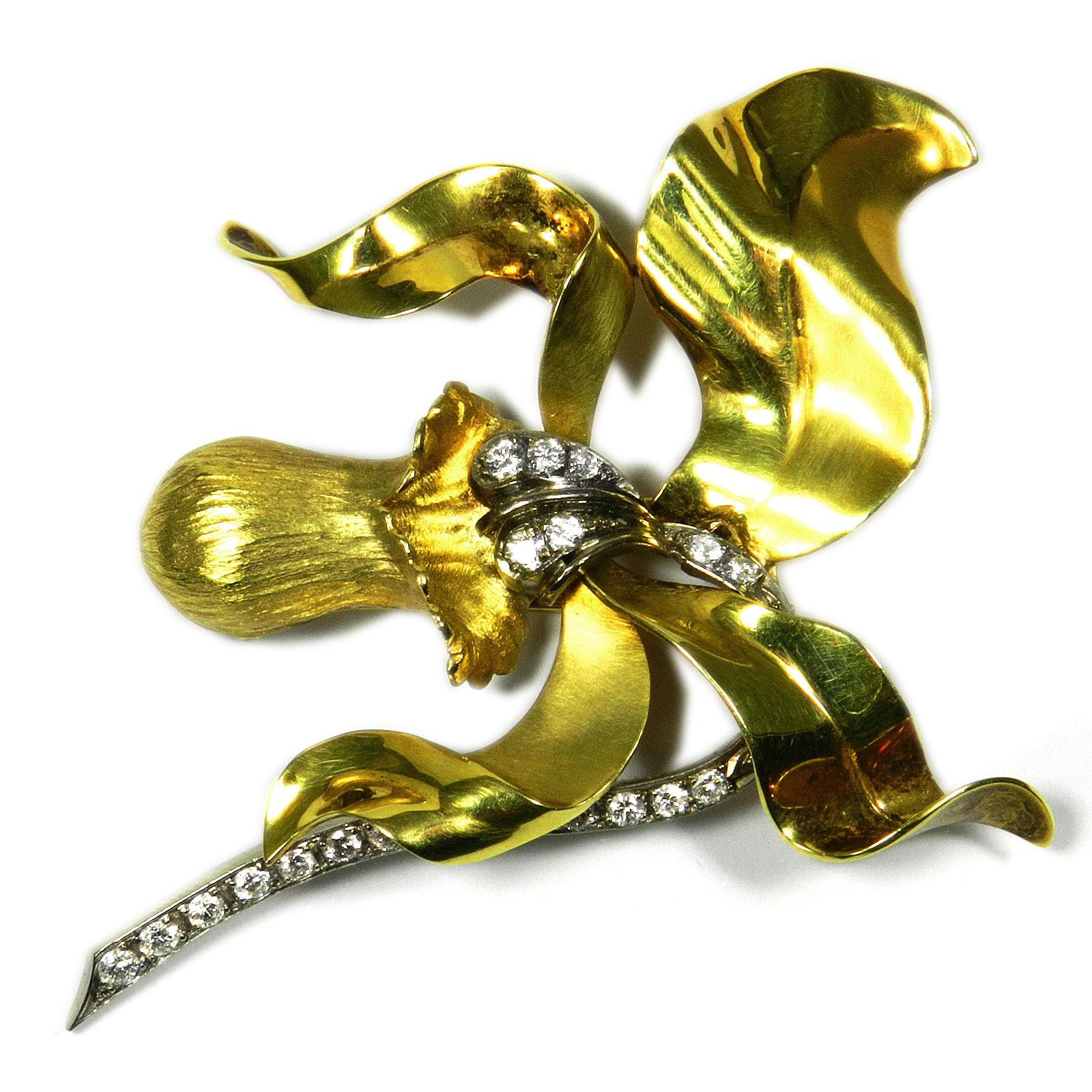 Signed Retro diamond gold orchid clip brooch circa 1950

This decorative clip brooch of impressive size is designed as a vivid orchid blossom, set with sparkling diamonds. The diamonds totaling approximately 0.85 carat, mounted in white gold. Signed