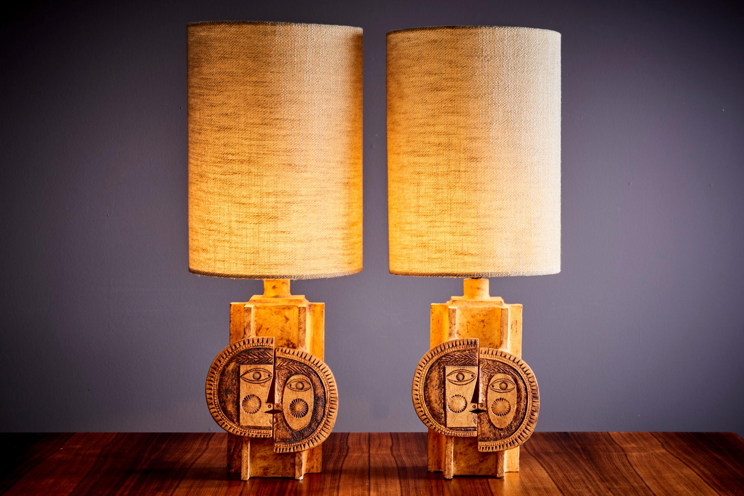 signed Roger Capron & Jean Derval Pair of Iconic Ceramic table lamps. The depth and width given apply to the lampstand. 
Please note: Lamp should be fitted professionally in accordance to local requirements.